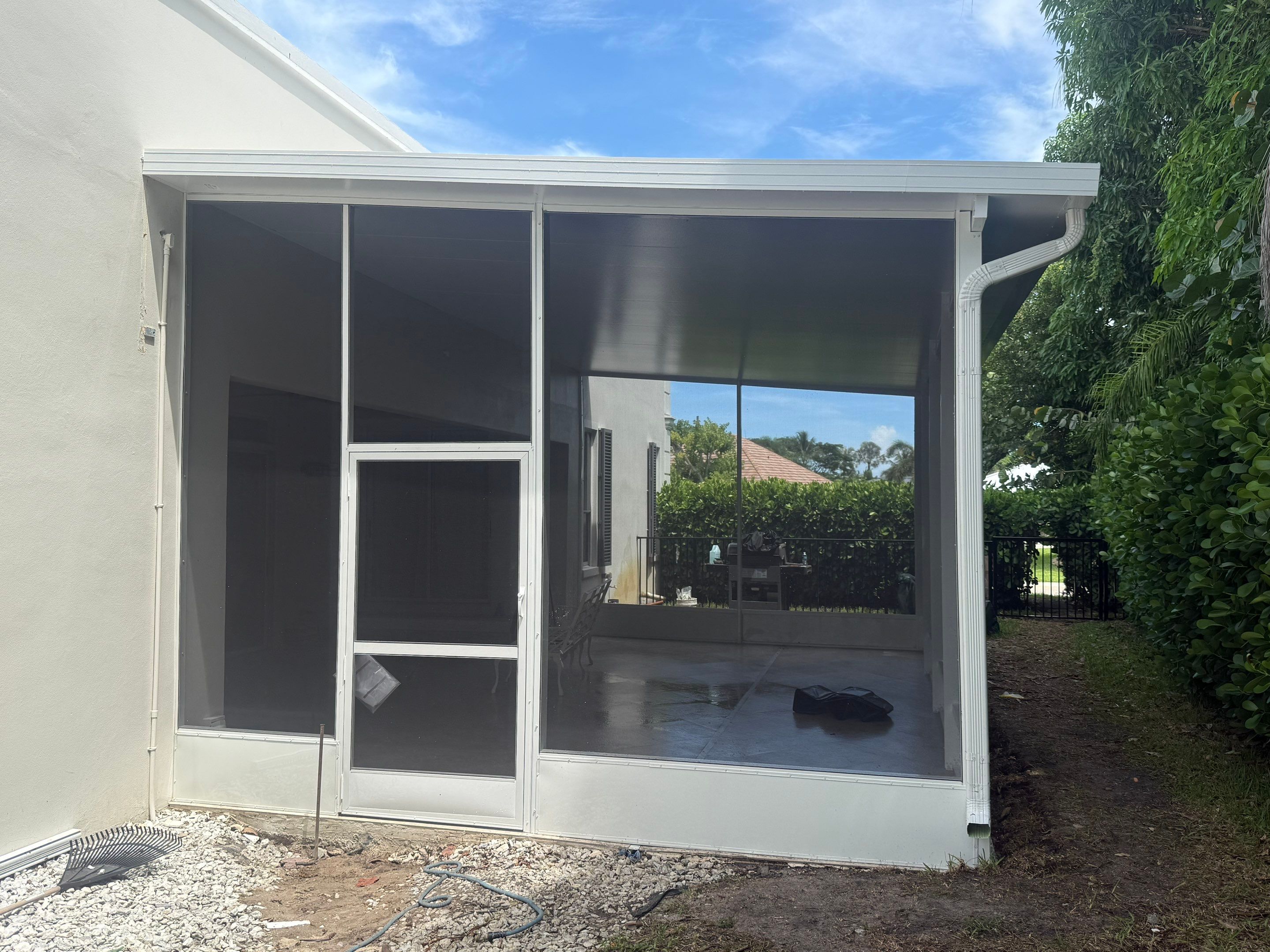 Aluminum Insulated Roof and Screen Enclosure Installation in Atlantis by The Screen Depot, Inc