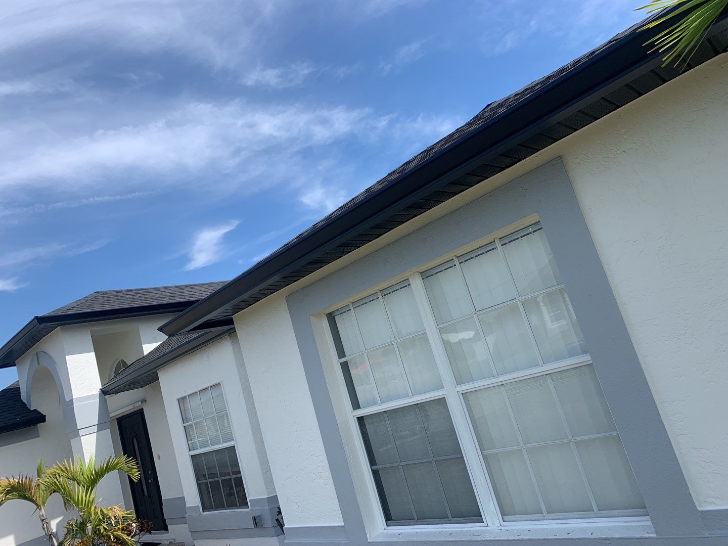 Black Seamless Gutters for Modern Cape Coral Homes by Gutter Professors
