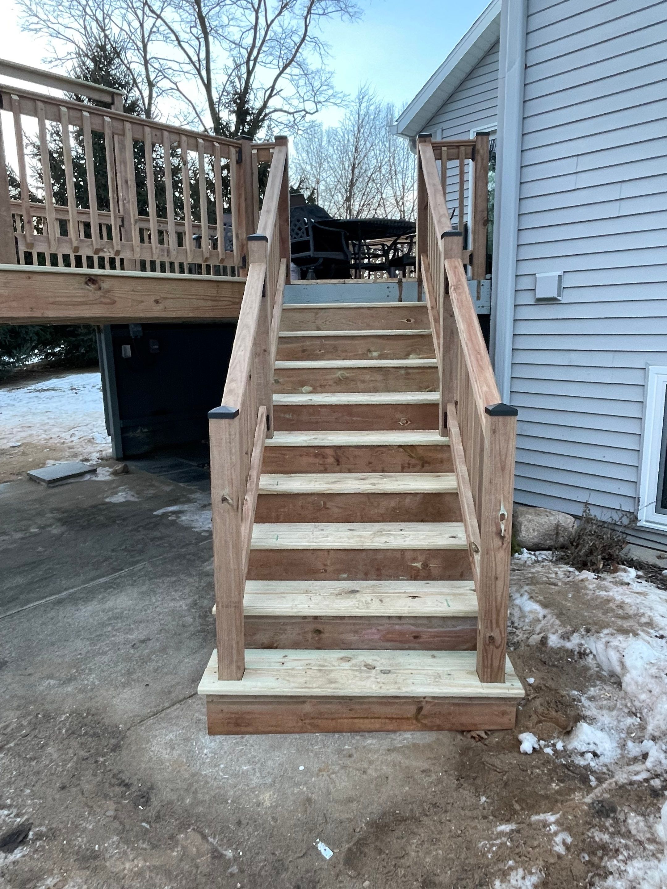 Deck Installation using Treated Lumber by Avalon Roofing and Exteriors