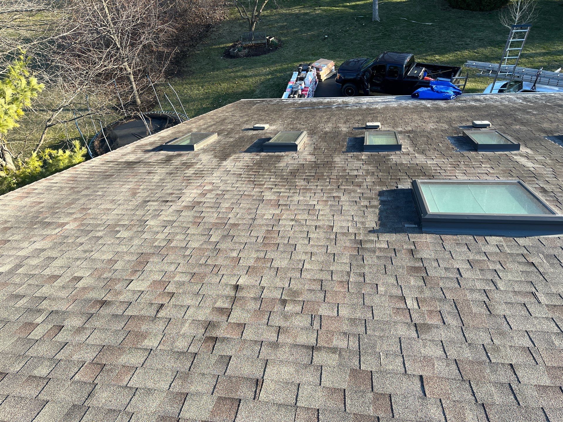 Asphalt Roof Replacement by Custom Installations