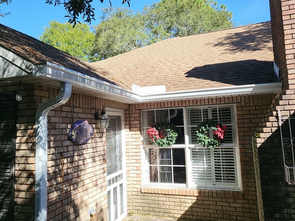 Seamless Gutter Installation using K-Style Seamless Gutters and LeafBlaster Pro Gutter Guards by Gutter Professors