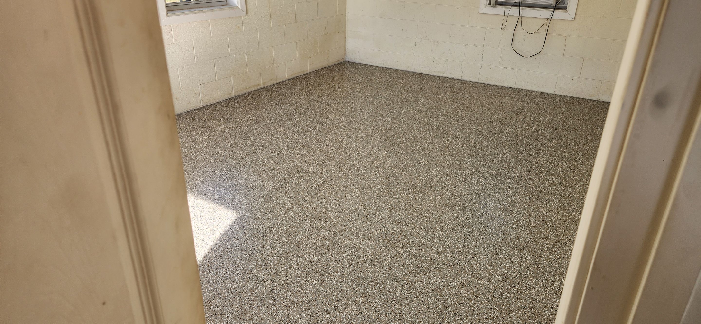 Porch & Garage Using Rocky Ridge & Creekbed by Elite Floor Solutions