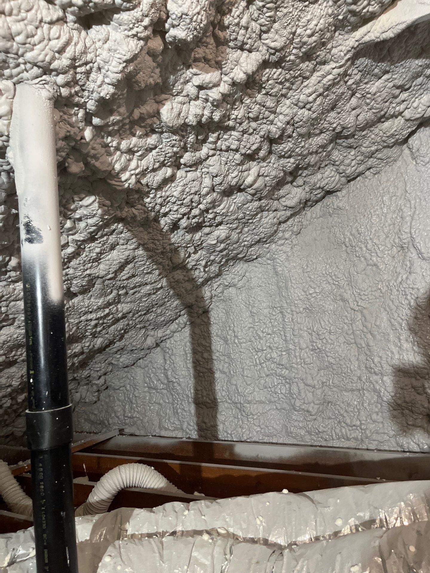 Attic Insulation using open cell spray foam by NYS Foam & Energy