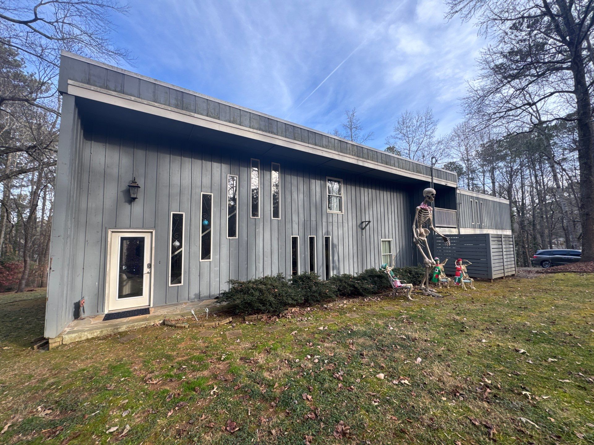 Full Exterior Transformation With Modern Black Finish by Swift Home Renovations 