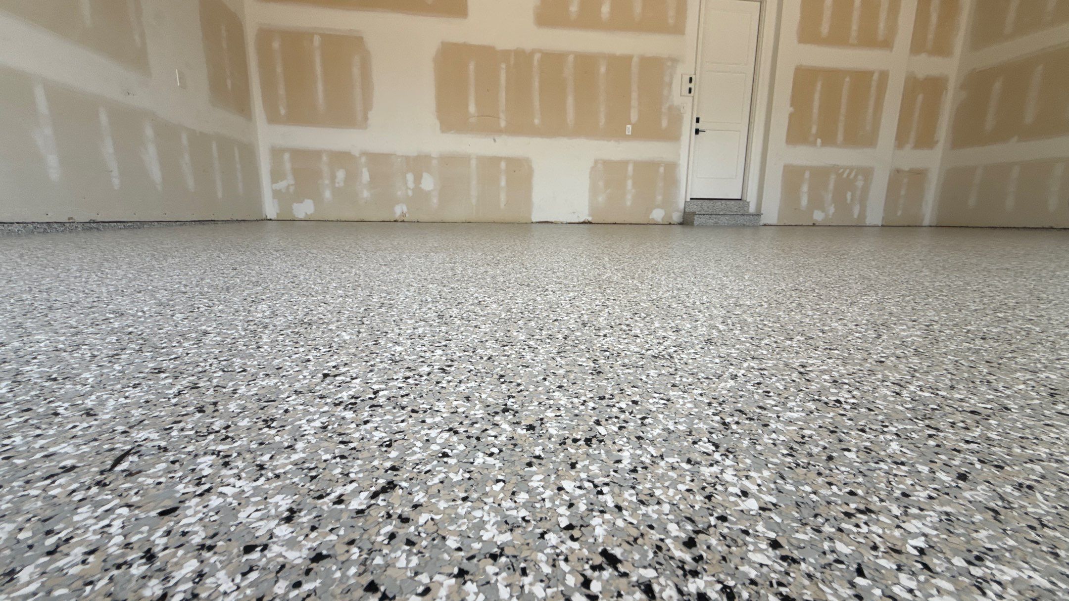Comprehensive Garage Renovation Featuring Epoxy Flooring by Banner Garage