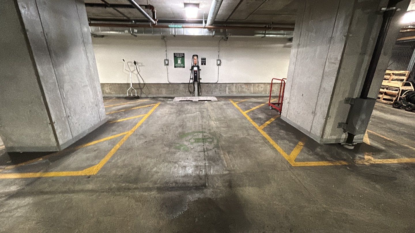 Parking garage using Hot water by Northern Power Washing LLC.