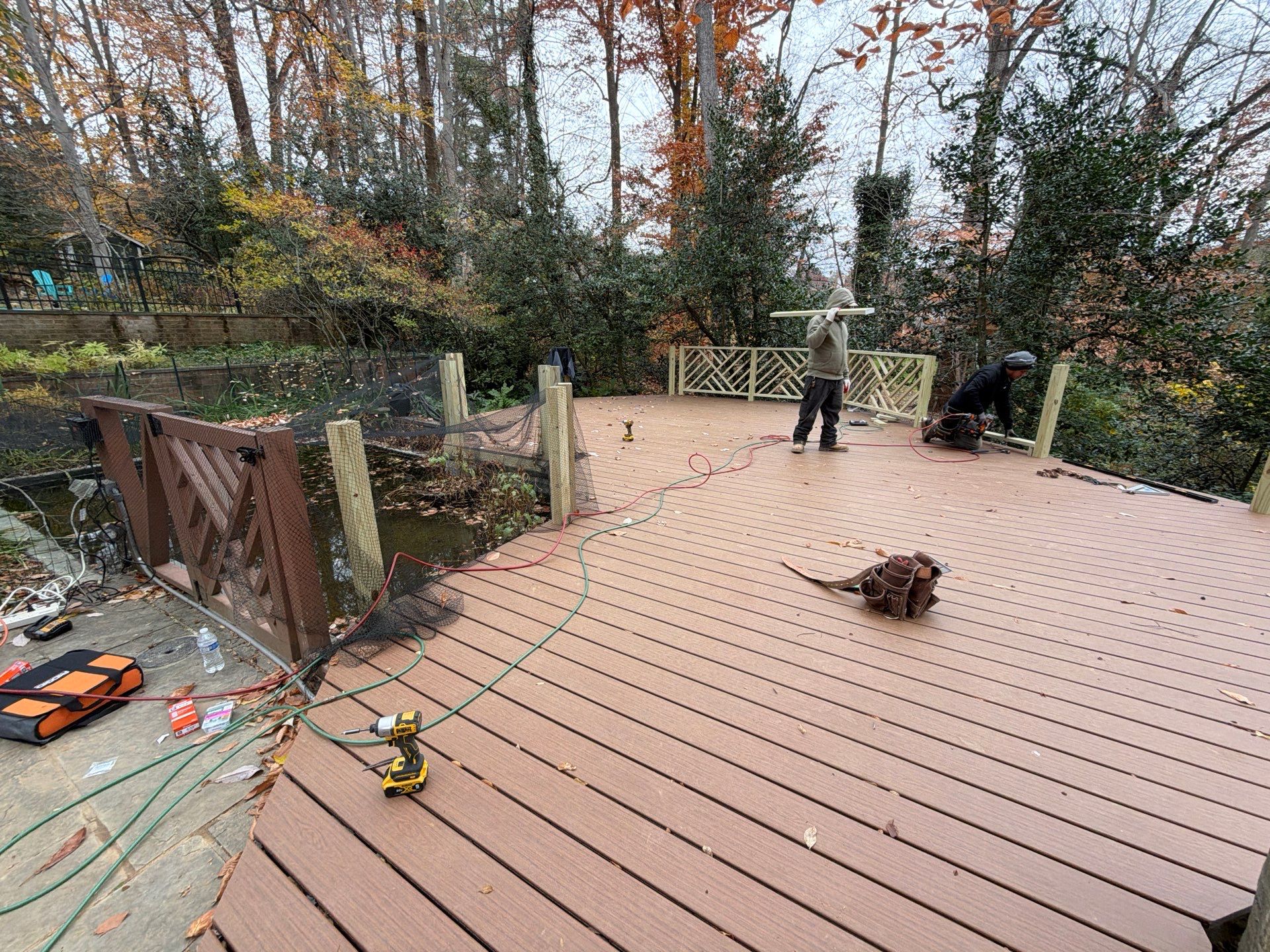 Custom Composite Deck Replacement with Geometric Railing in Bethesda, MD by Jakari Restoration & Construction LLC