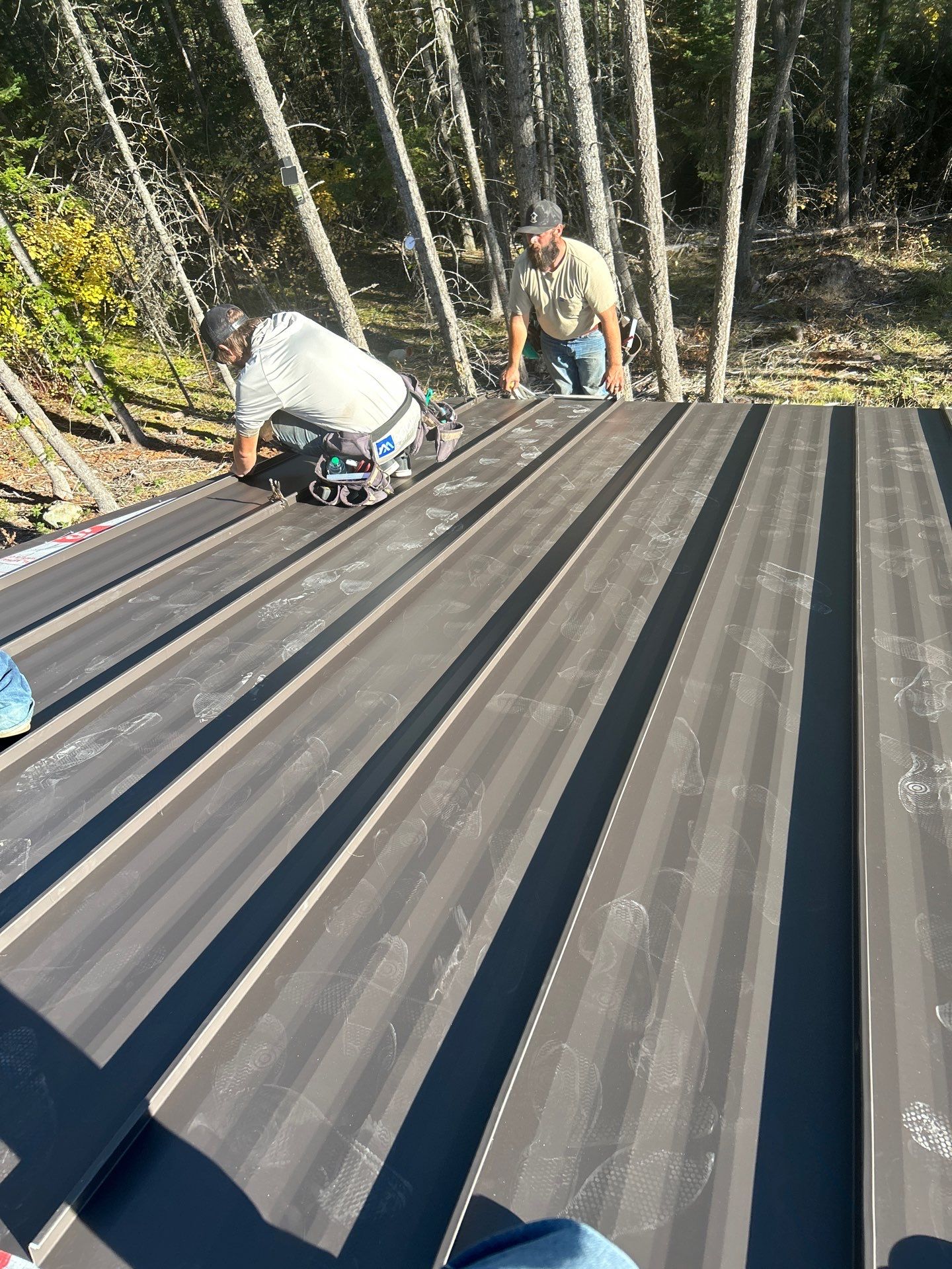Mechanical Lock Standing Seam - CMG ULG Dark Bronze  by Montana Roofing Solutions