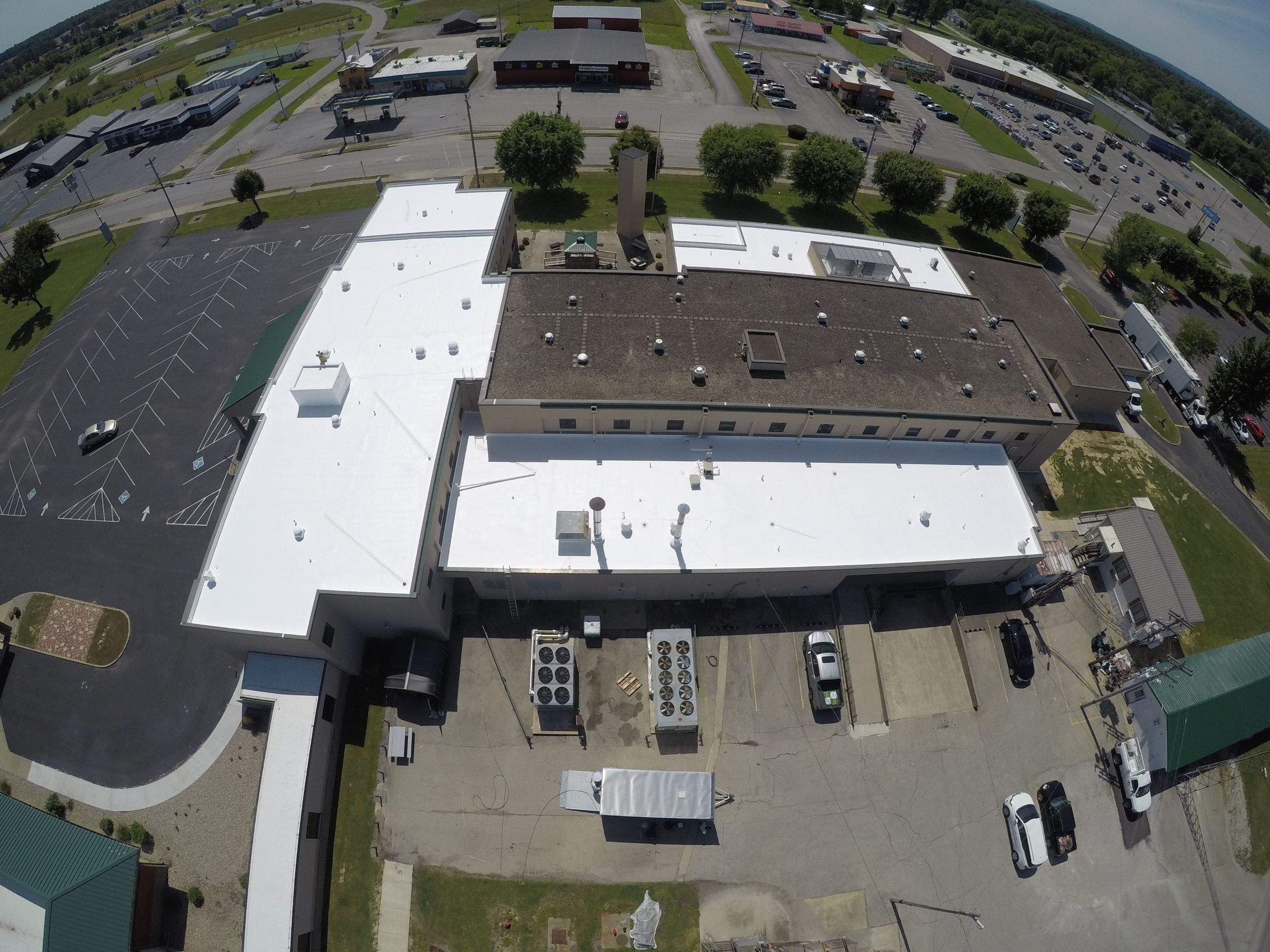 Commercial Roofing Installation using Coatings by Kentucky Commercial Roofing