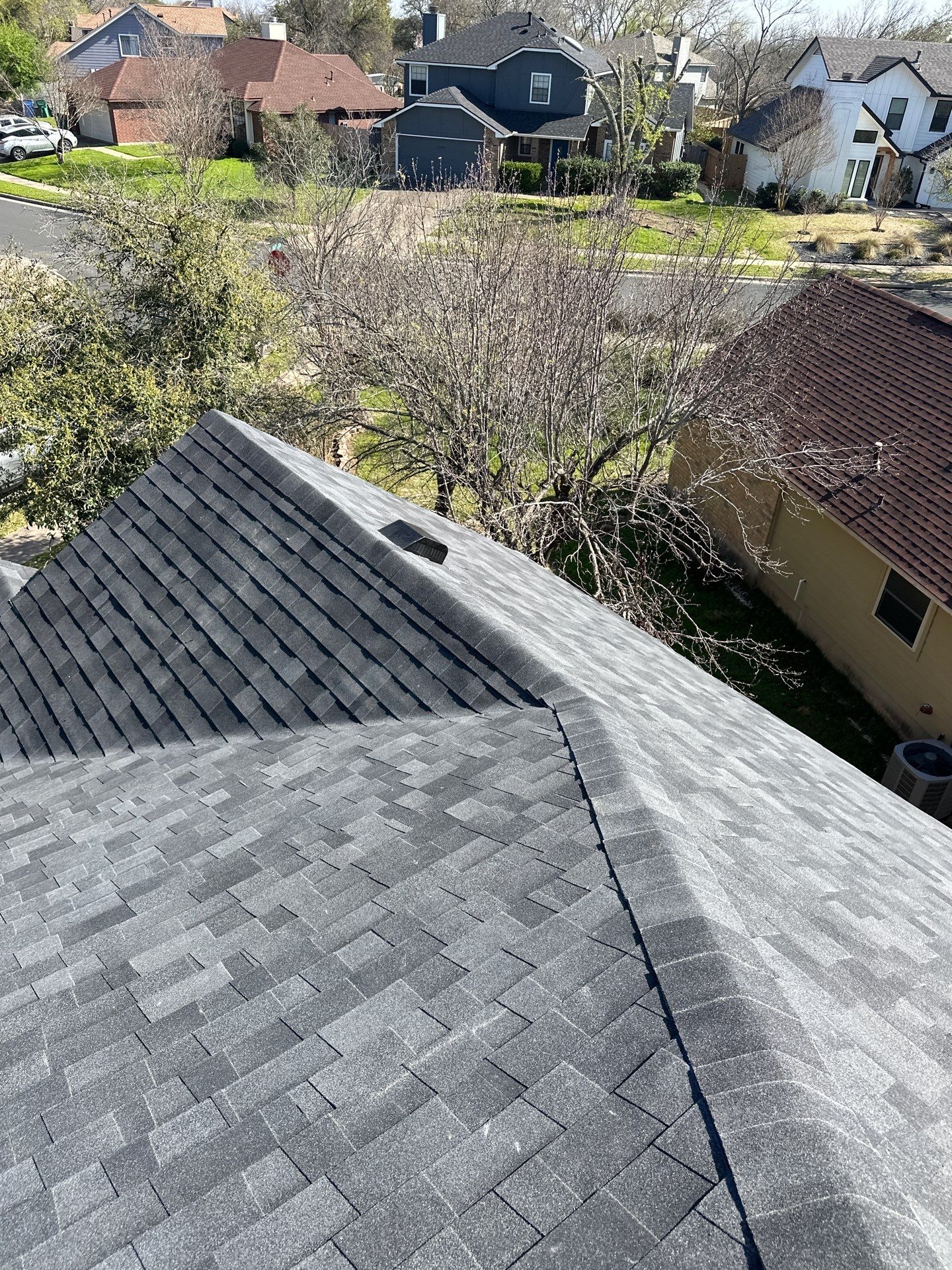 Residential Roofing Installation using Malarkey Vista Class 3 Matte Black by DeZign Roofing & Exteriors