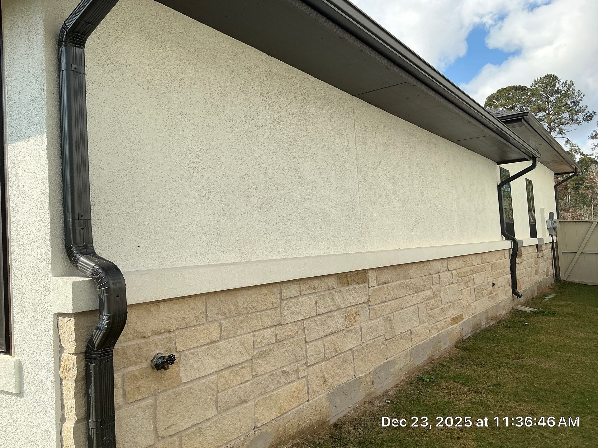 Magnolia Contrast: Light Stucco with Dark Accents and Stone Details by Apex Conventional Stucco Llc