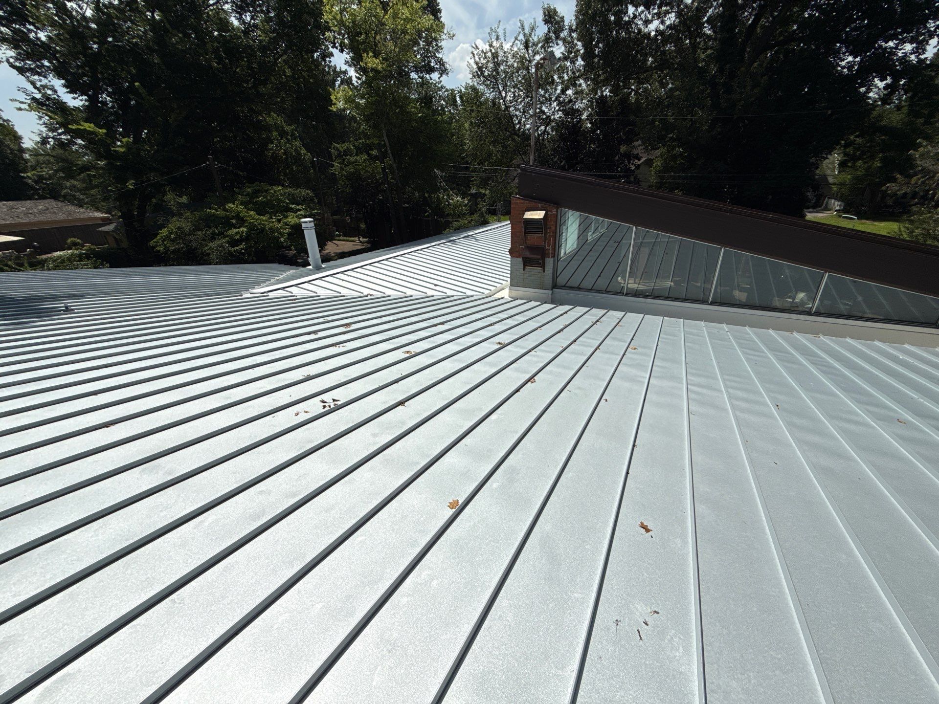 Residential Standing Seam Metal Roof and Membrane Replacement in Memphis by Revival Roofing Services