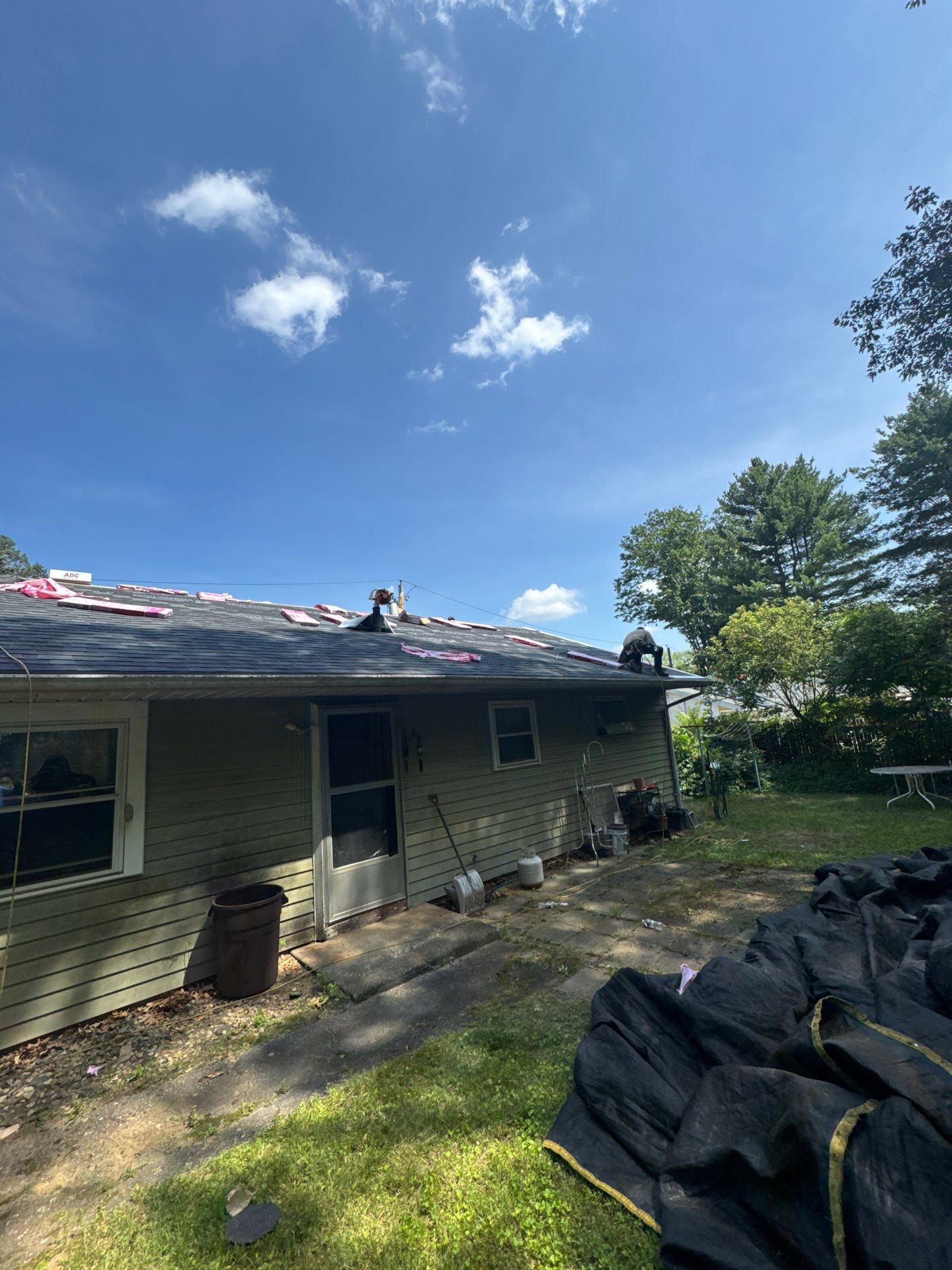 Onyx Black Roof Transformation in Maynard, MA by Mighty Dog Roofing of Greater Middlesex County