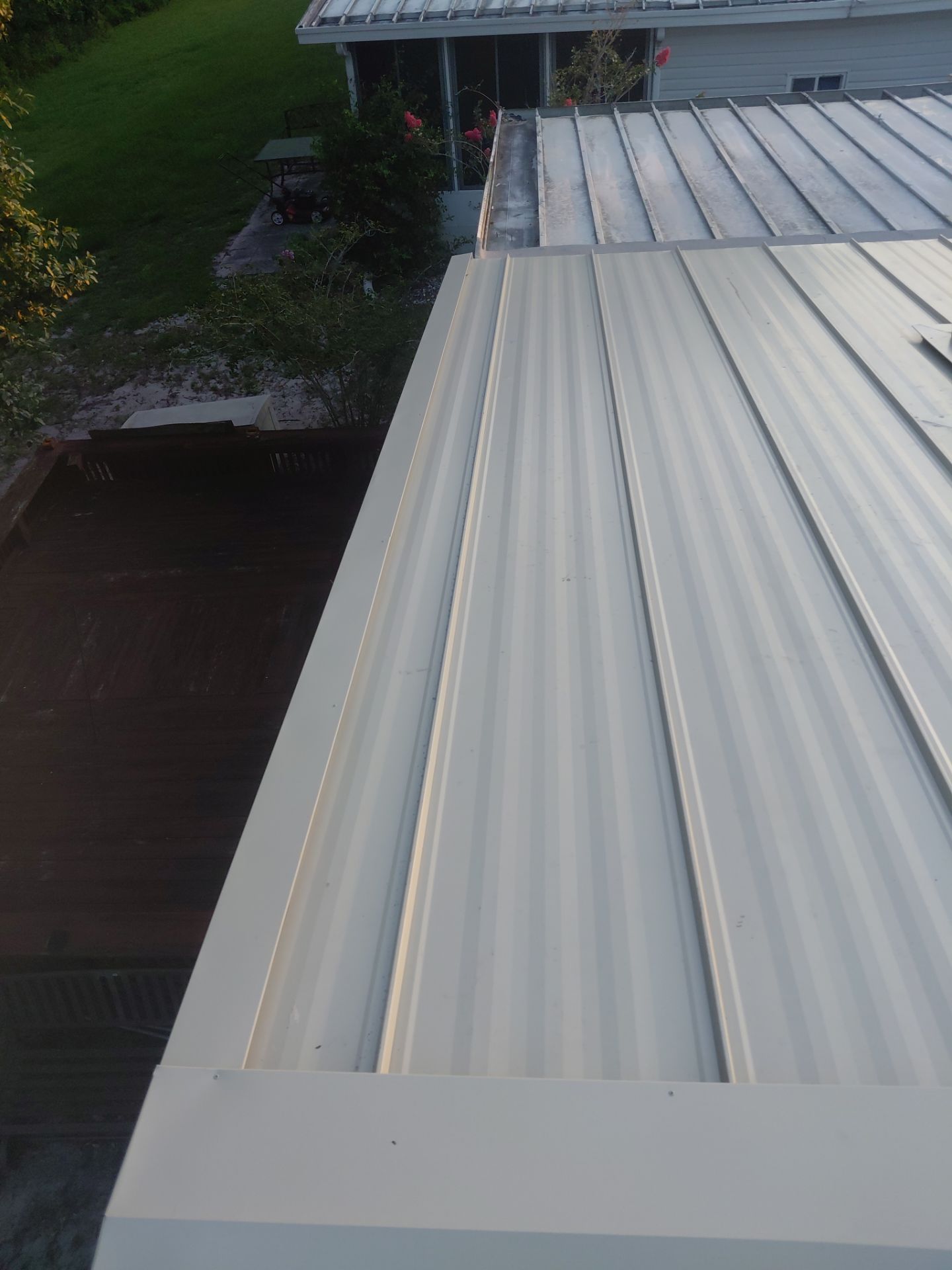 Orlando Residential Standing Seam Metal Roof Installation in Light Stone by Pinnacle Roofing Group