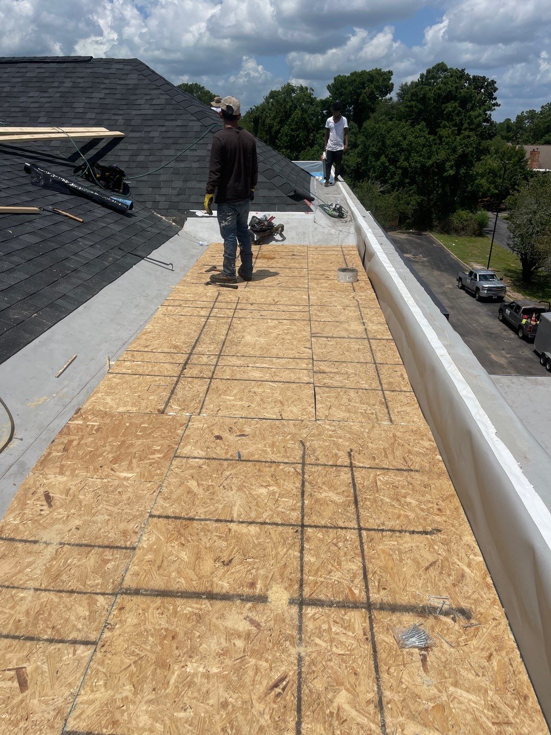 Commercial Roofing Installation using Roof Replacement by American Roofing & Construction LLC