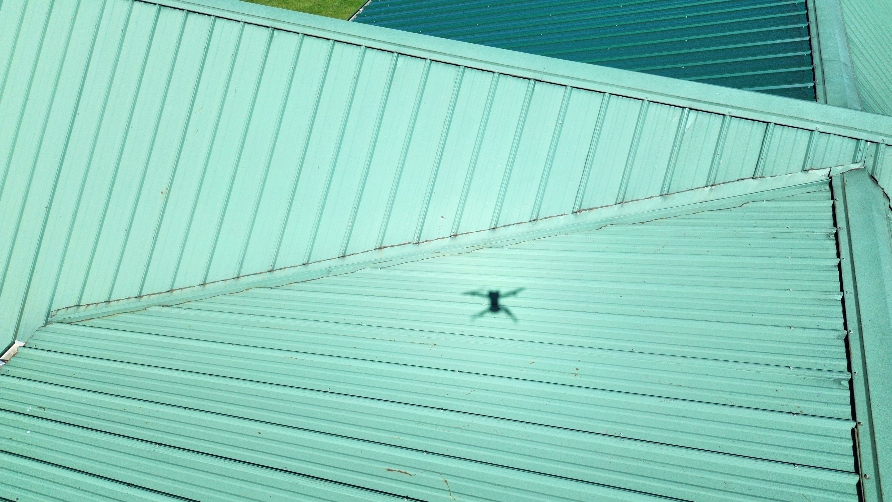Residential Roofing Installation using Performance Panel Metal - Frost Black by RoofX 