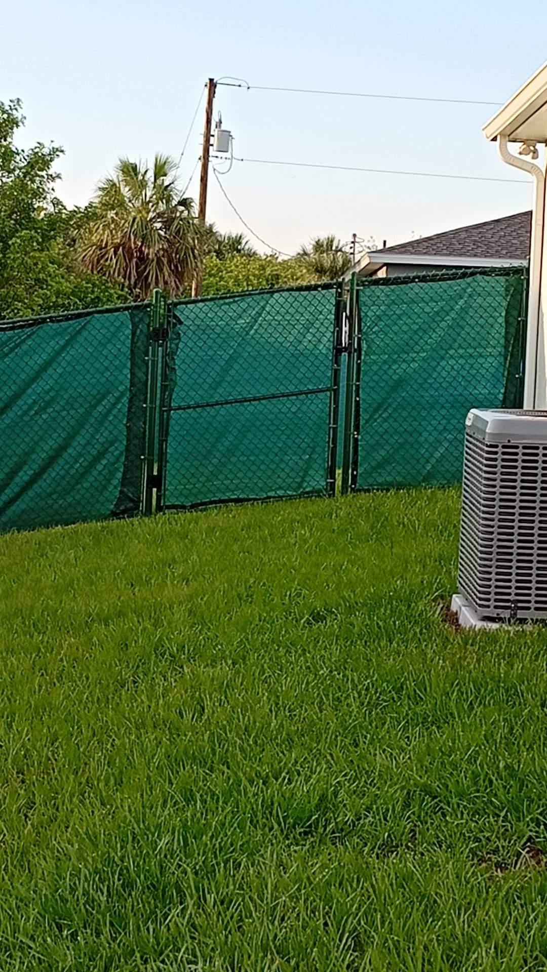 Chain Link Fence Installation with Custom Beach Privacy Screen in Port Charlotte by True Fence LLC