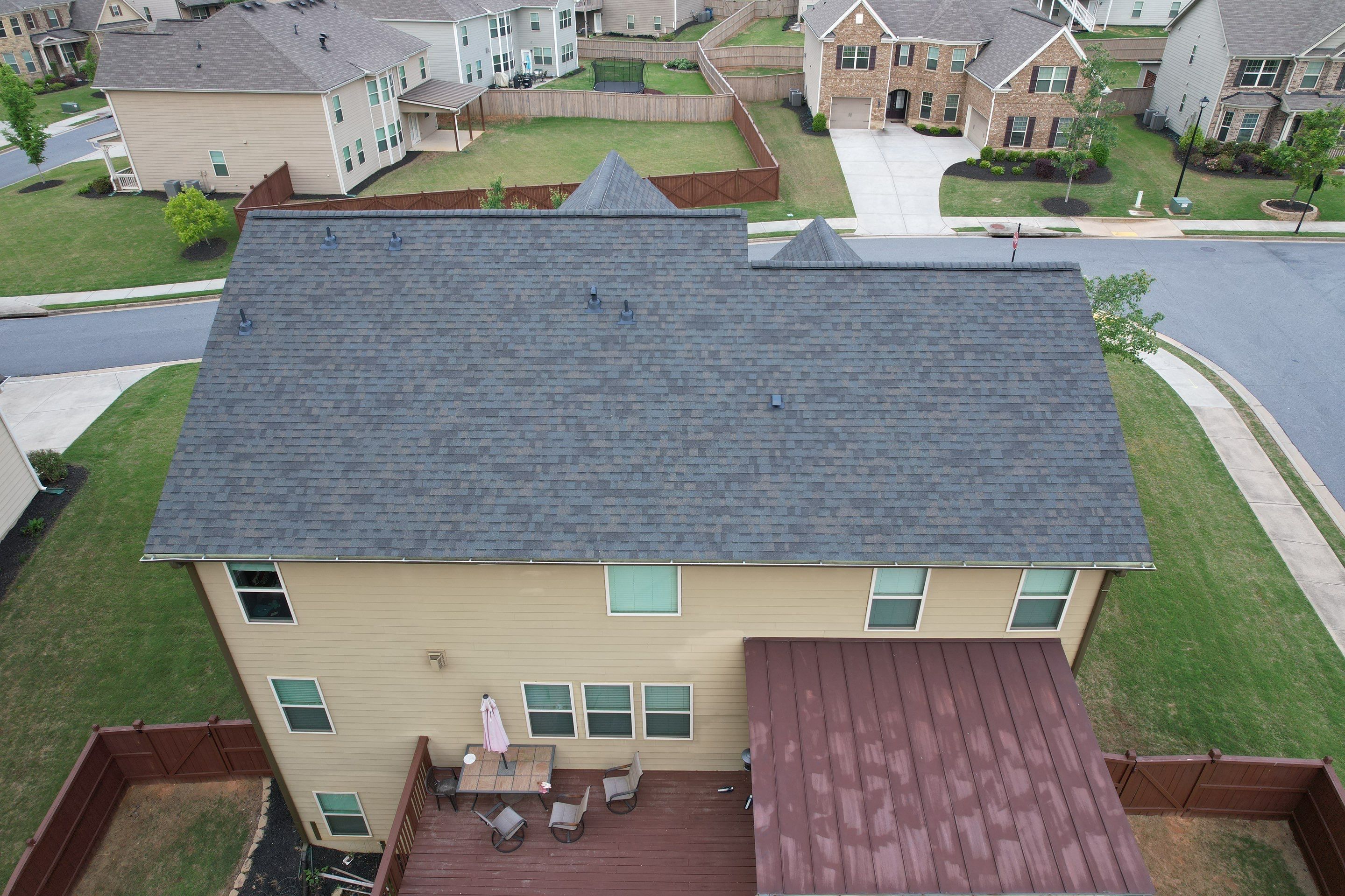 Residential Roofing Installation using Owens Corning TruDef Peppermill Gray by Inspector Roofing and Restoration