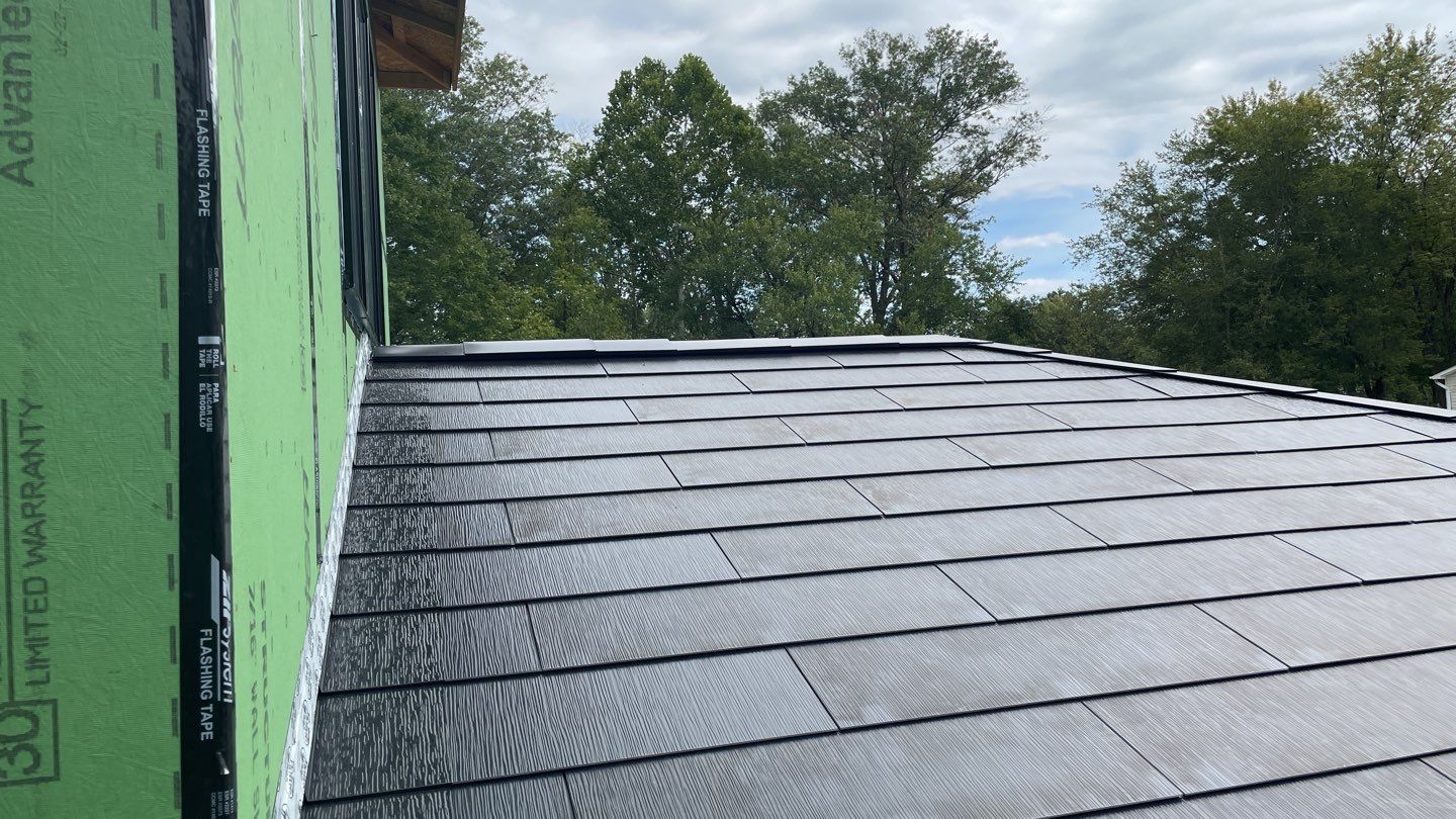 Tesla Solar Roof  using Tesla Solar Roof V3 tiles by American Home Contractors