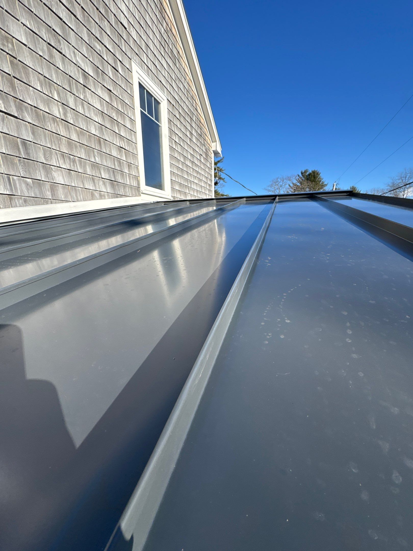 Standing Seam Metal Roof Replacement in Kittery Point, Maine by Compass exteriors