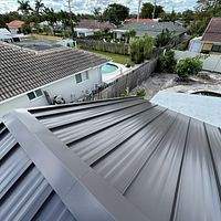 24ga 1.5" Mechanical Seam Dark Bronze by Total Roofing System The Metal Roof Experts