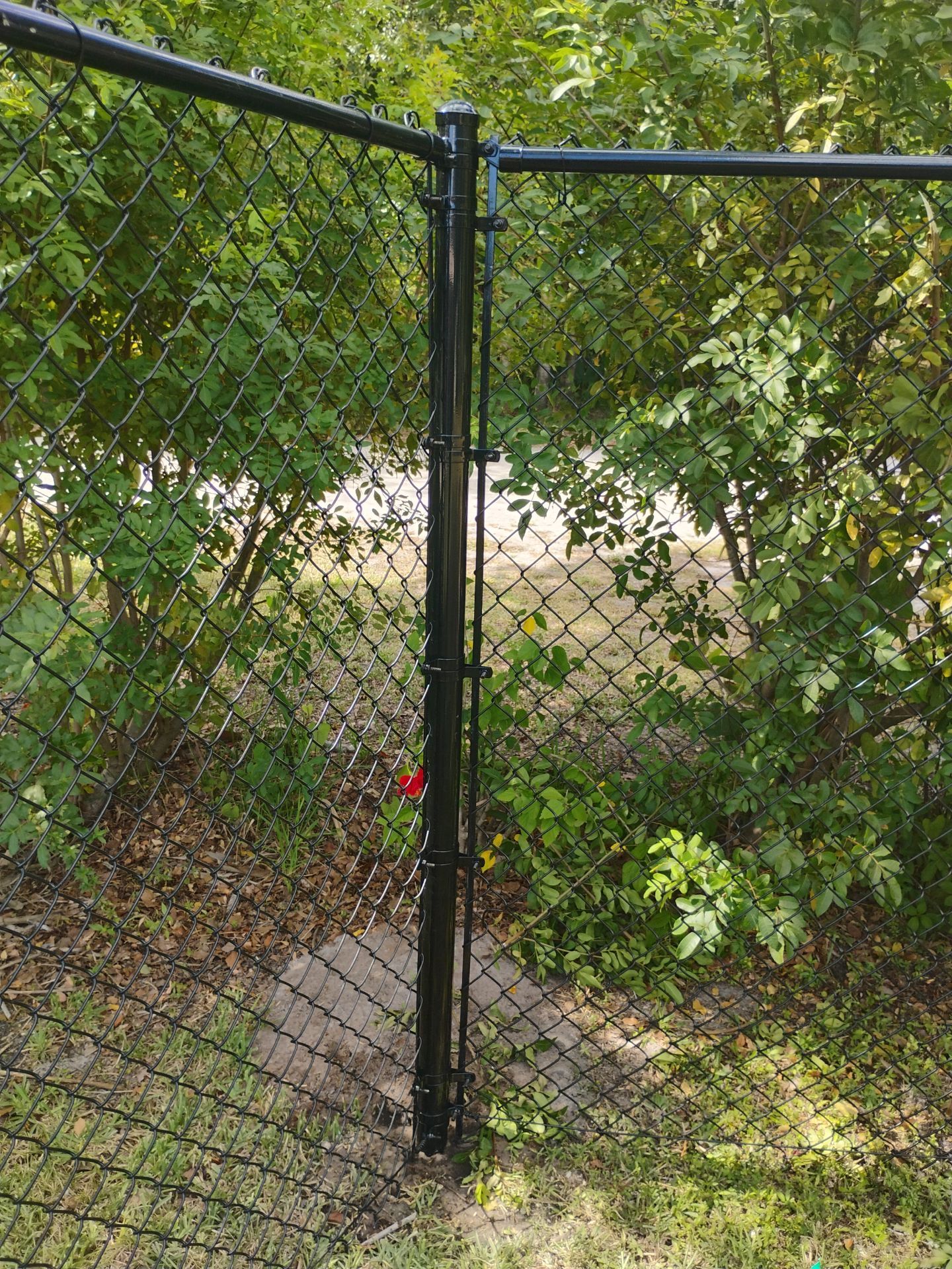 Black Vinyl Chain Link Fence Installation in Arcadia Florida by True Fence LLC