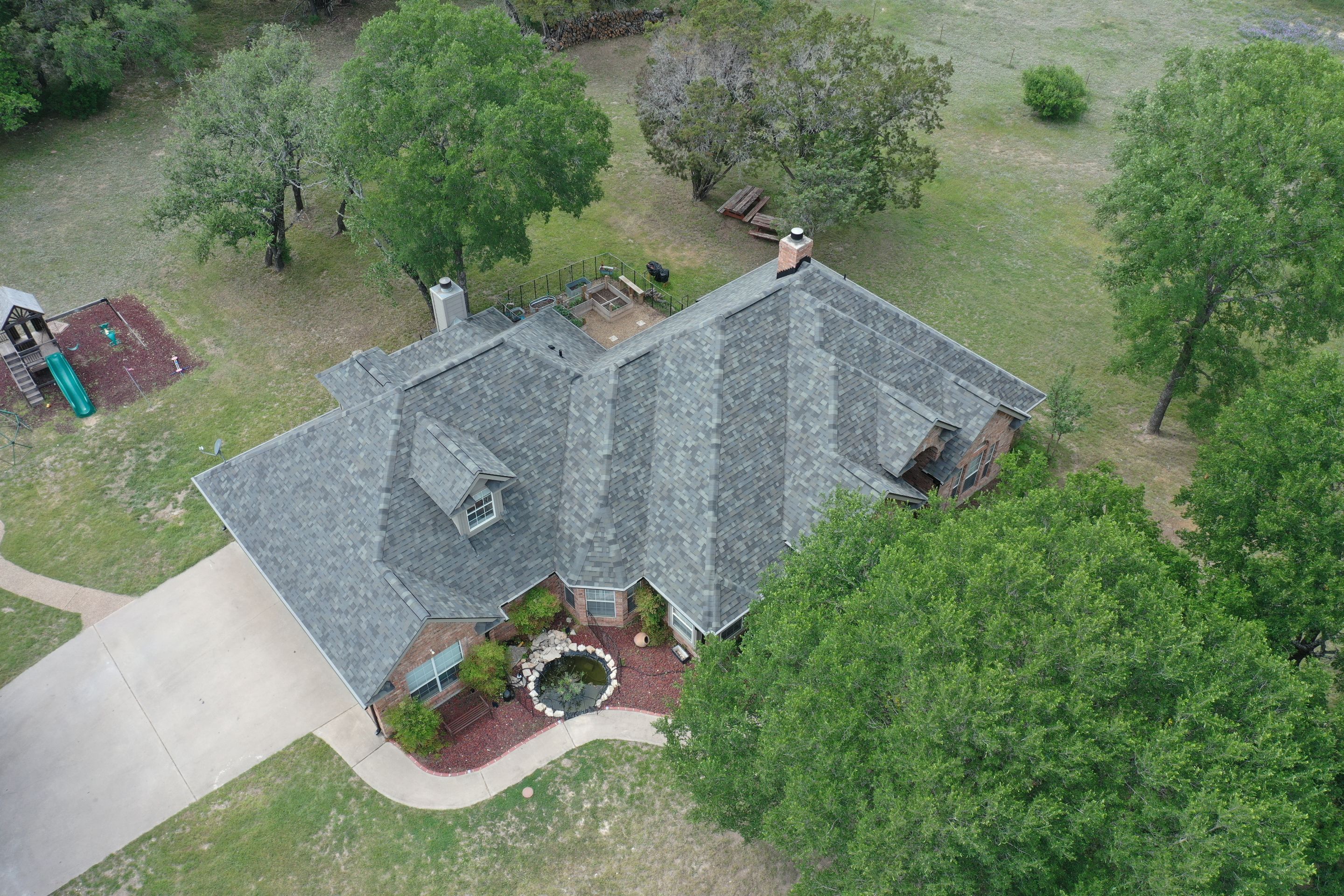 Residential Roof Replacement using Malarkey Vista AR - Storm Grey by Action Exteriors Austin
