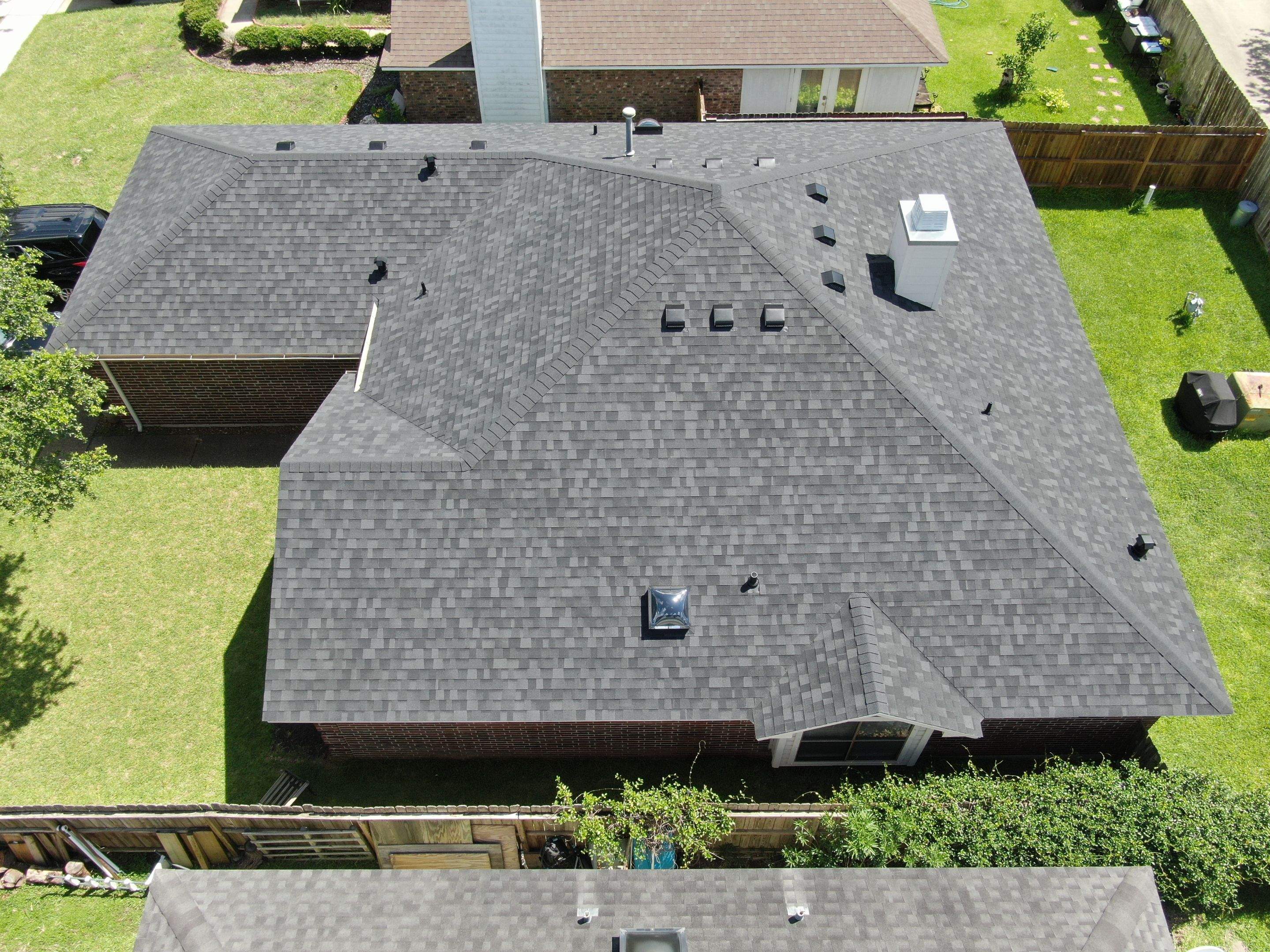 Nothing looks nicer than a little black roof by Bayfront Roofing and Construction