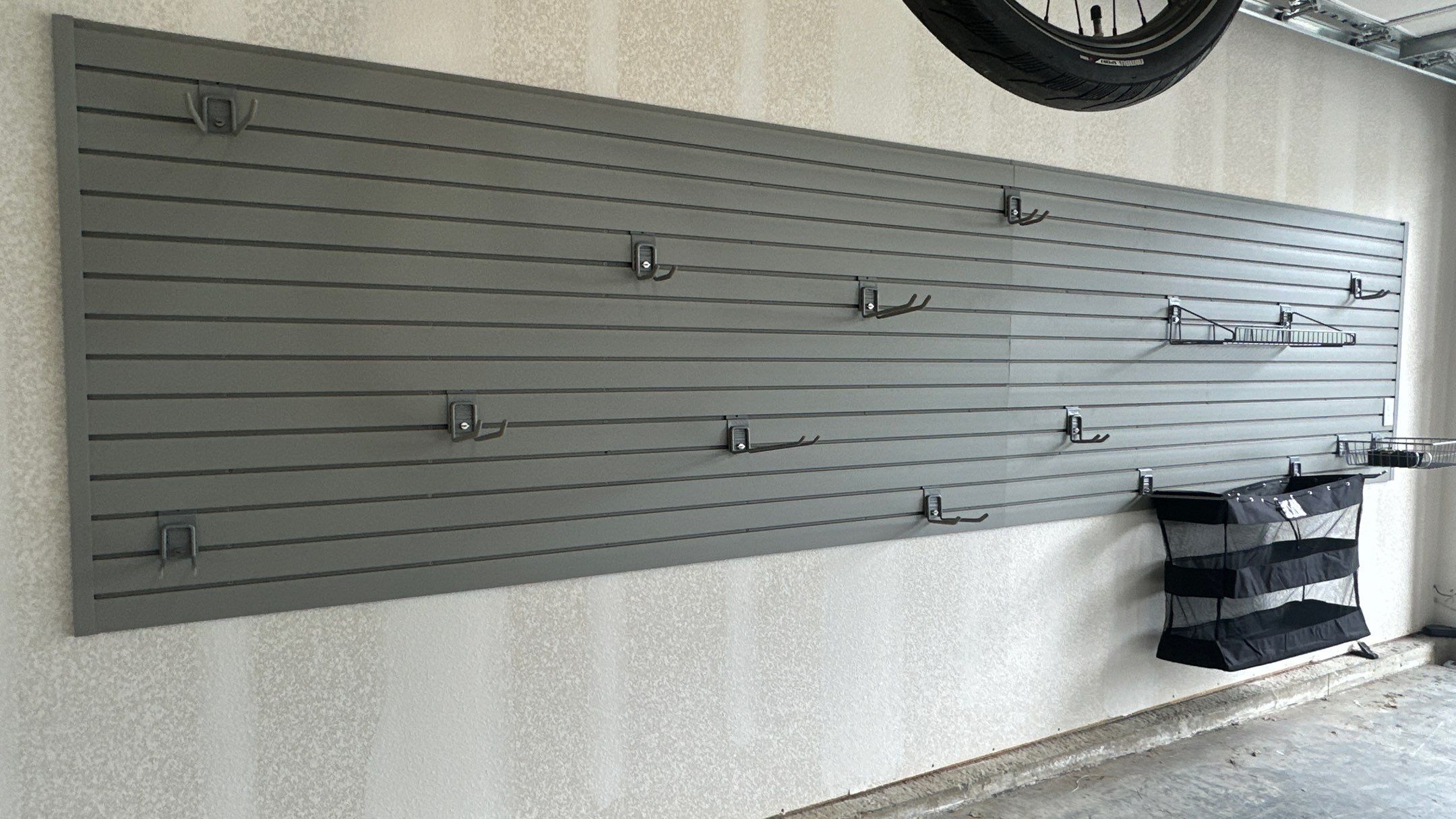 Jim H. added Slotwall and bike hoist to his garage by Banner Garage