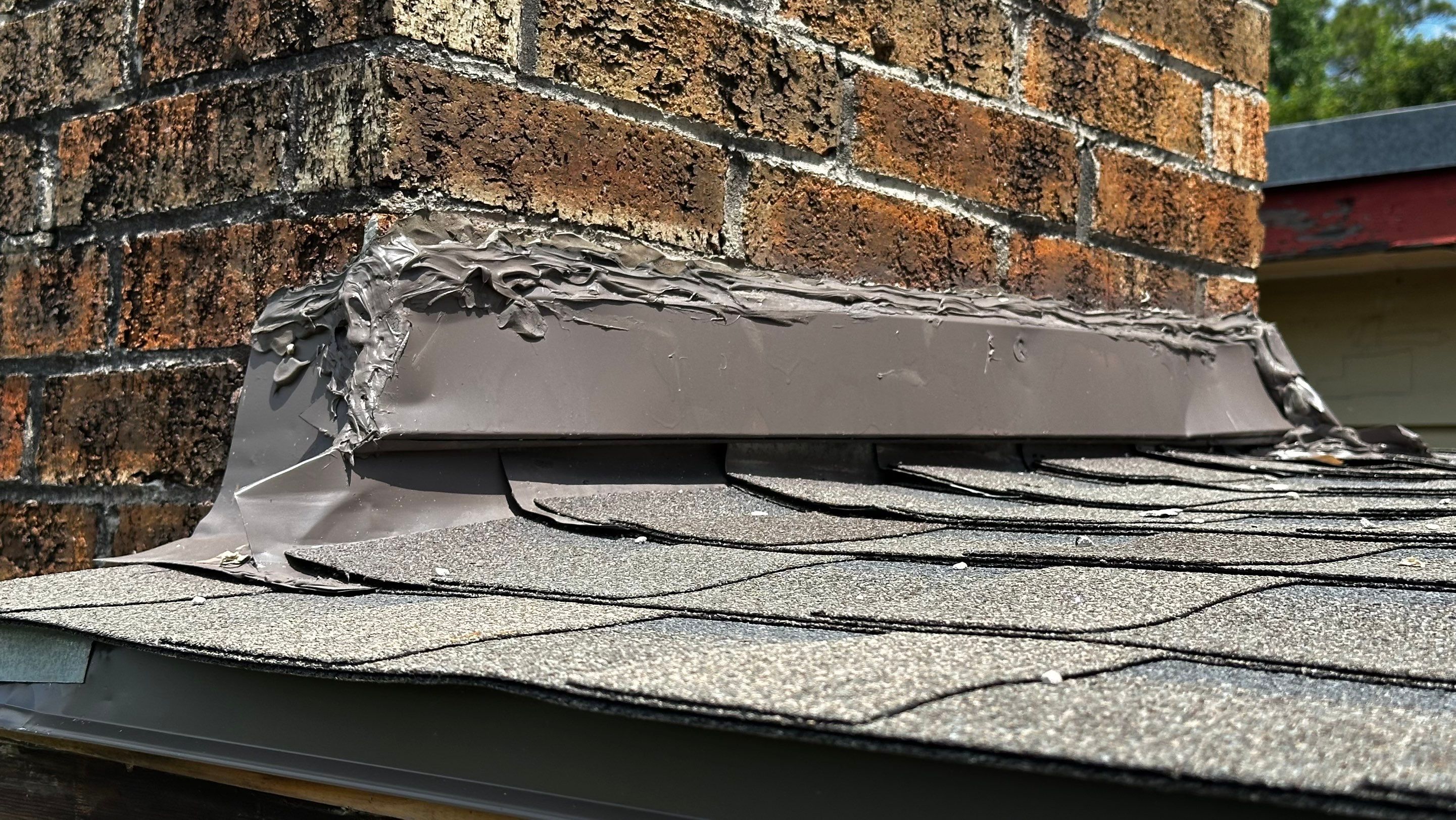 Roof Replacement with Chimney Flashing Detail — Houston, TX by PL Roofing & SB Roofing, LLC.