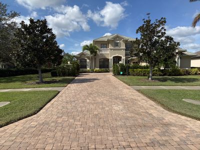 Revitalizing Outdoor Spaces: Decorative Wall & Driveway Transformation in Winding River, Bradenton