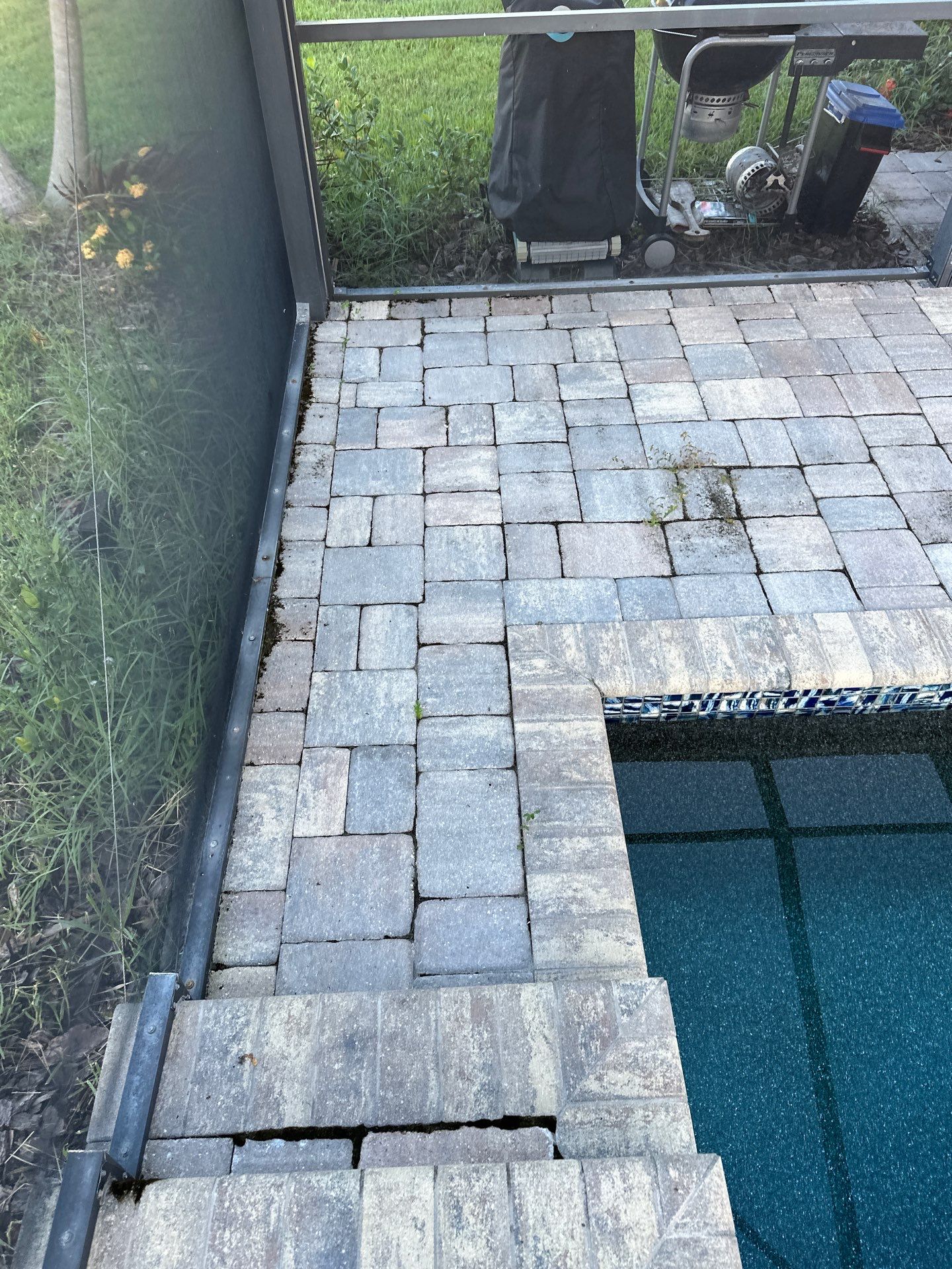 Paver Driveway, Sidewalk, and Pool Deck Cleaning in Winding River Community, Bradenton, FL by Sunshine AquaWash