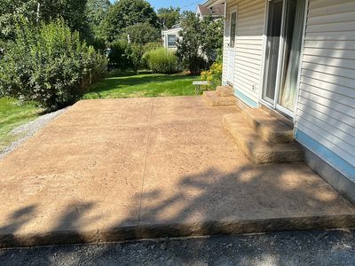 Bluestone textured stamped concrete patio