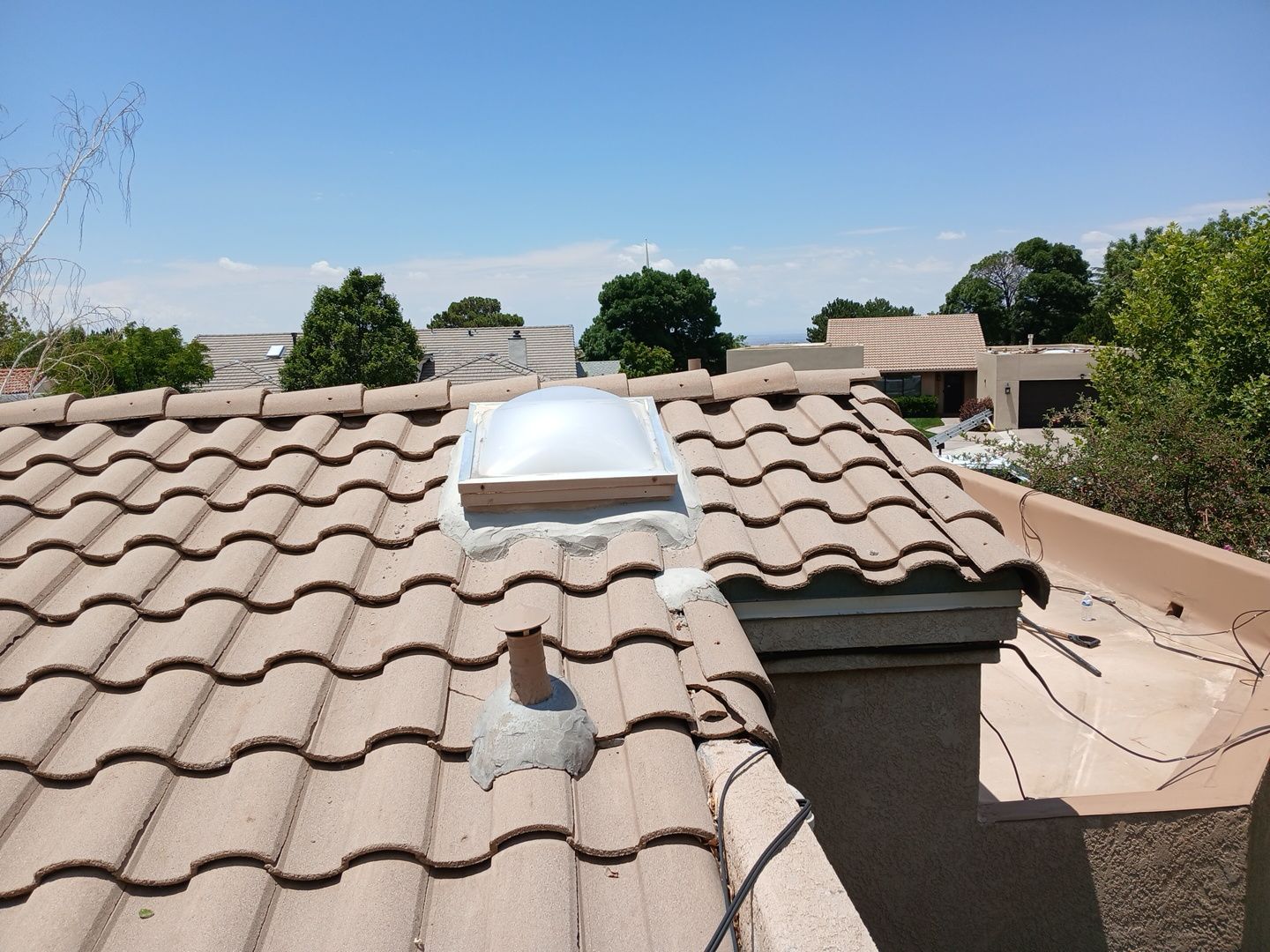 Tile and TPO Roof Maintenance and Gutter Cleaning in Sandia Heights by Doyle Roof Masters Inc