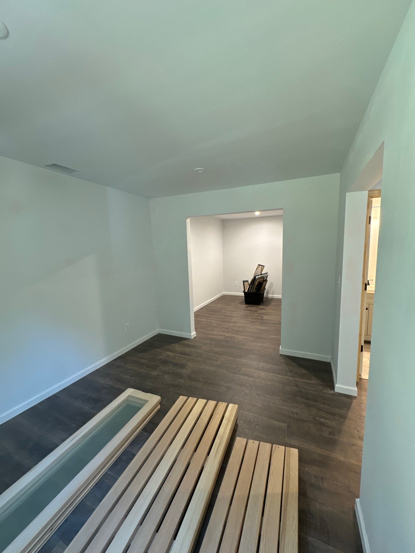 Finished Basement in Acworth Featuring a Full Bathroom and Bar by Swift Home Renovations