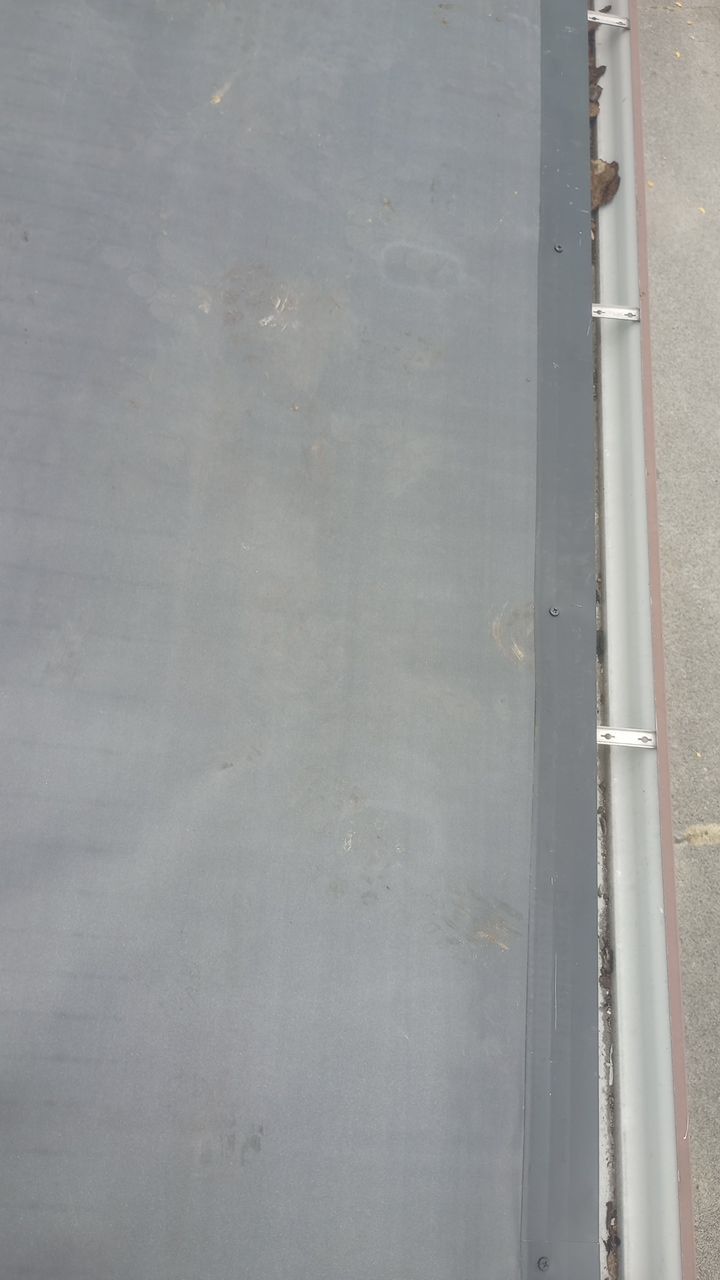 Commercial Roofing Installation using Performance Shingles by Mr. Roofer