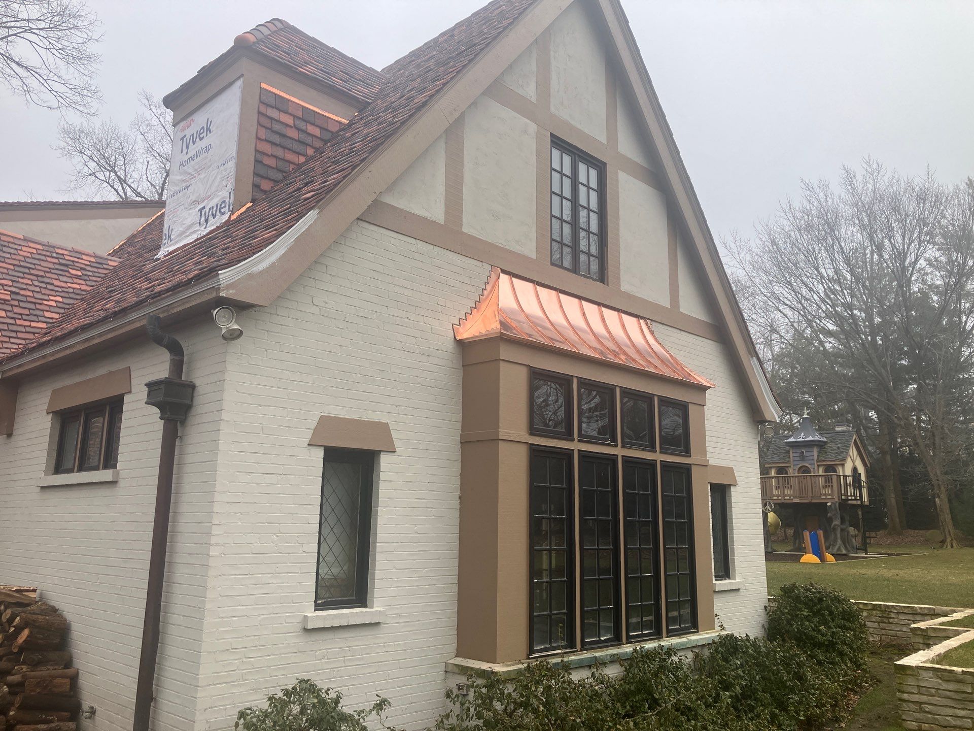 Ludowici Roof Installment and Half Round Copper Gutter Replacement  by Custom Installations