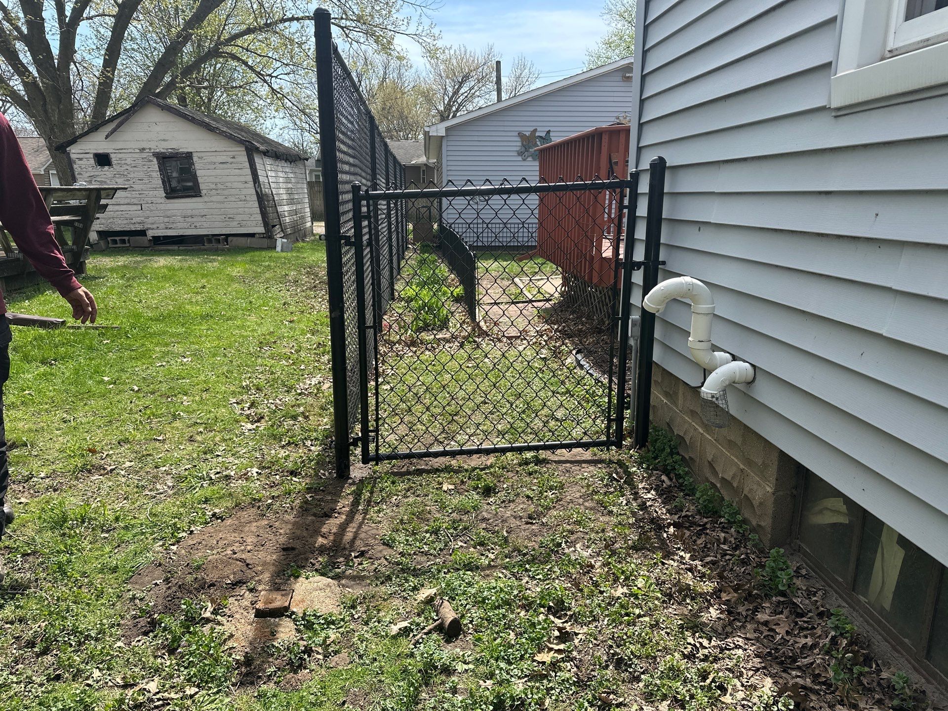 Black Chain Link Fence Installation for Waterloo Residential Backyard by Perfect Picket Fence and Stain