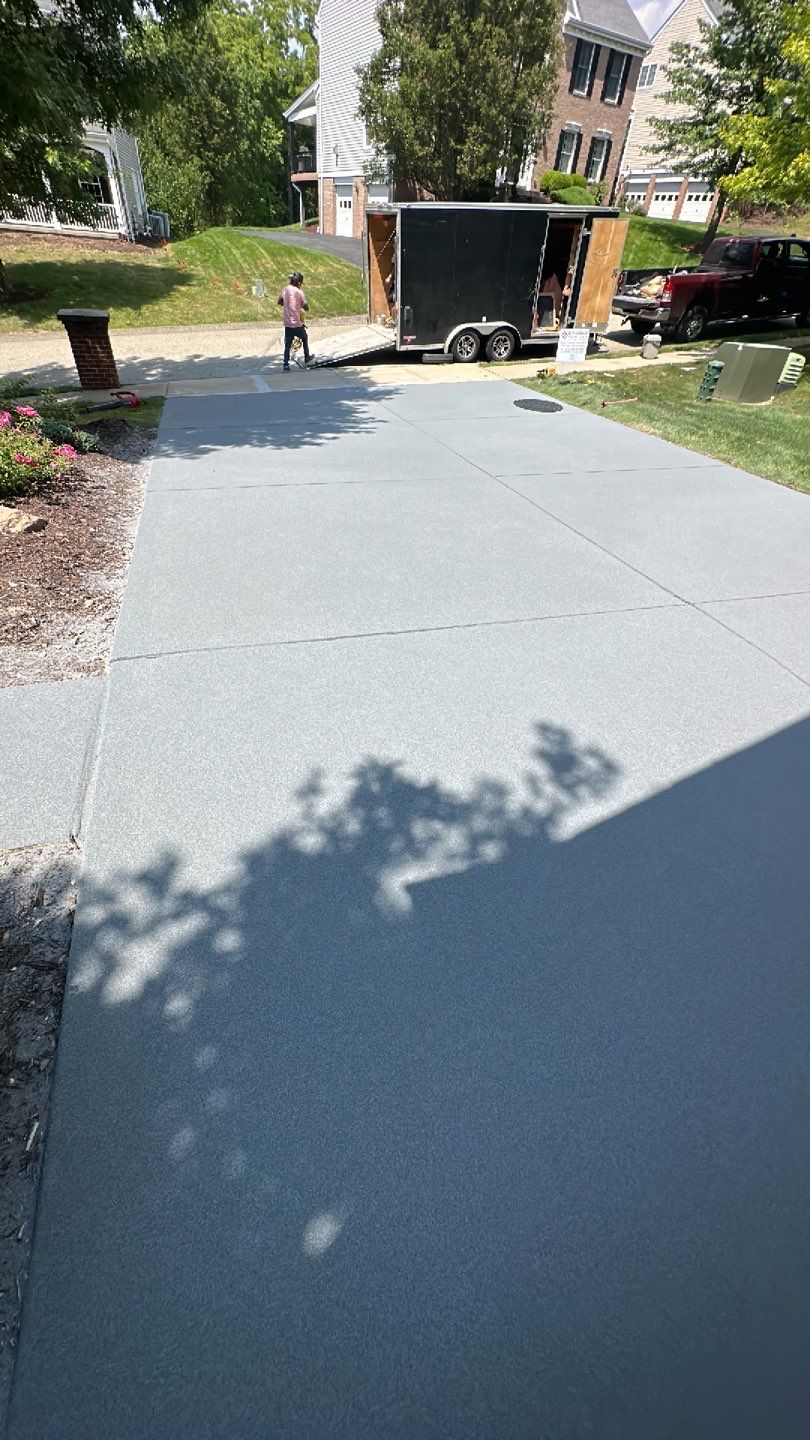 Pool Deck + Driveway + Garage Project in Venetia by Floors in a Day, Inc