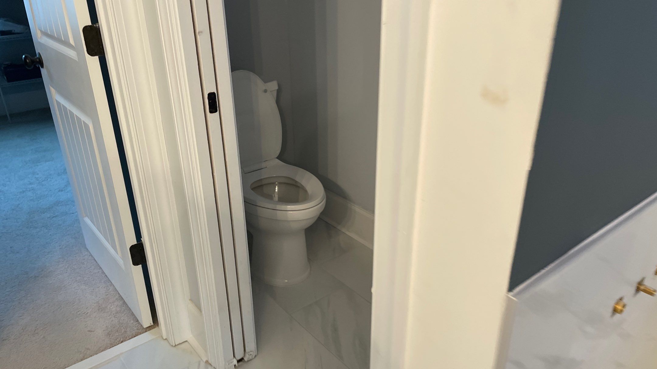 Bright Bathroom Remodel with Wall Removal, Stand Alone Tub and New Vanity by Footprints Floors of Coastal Carolina