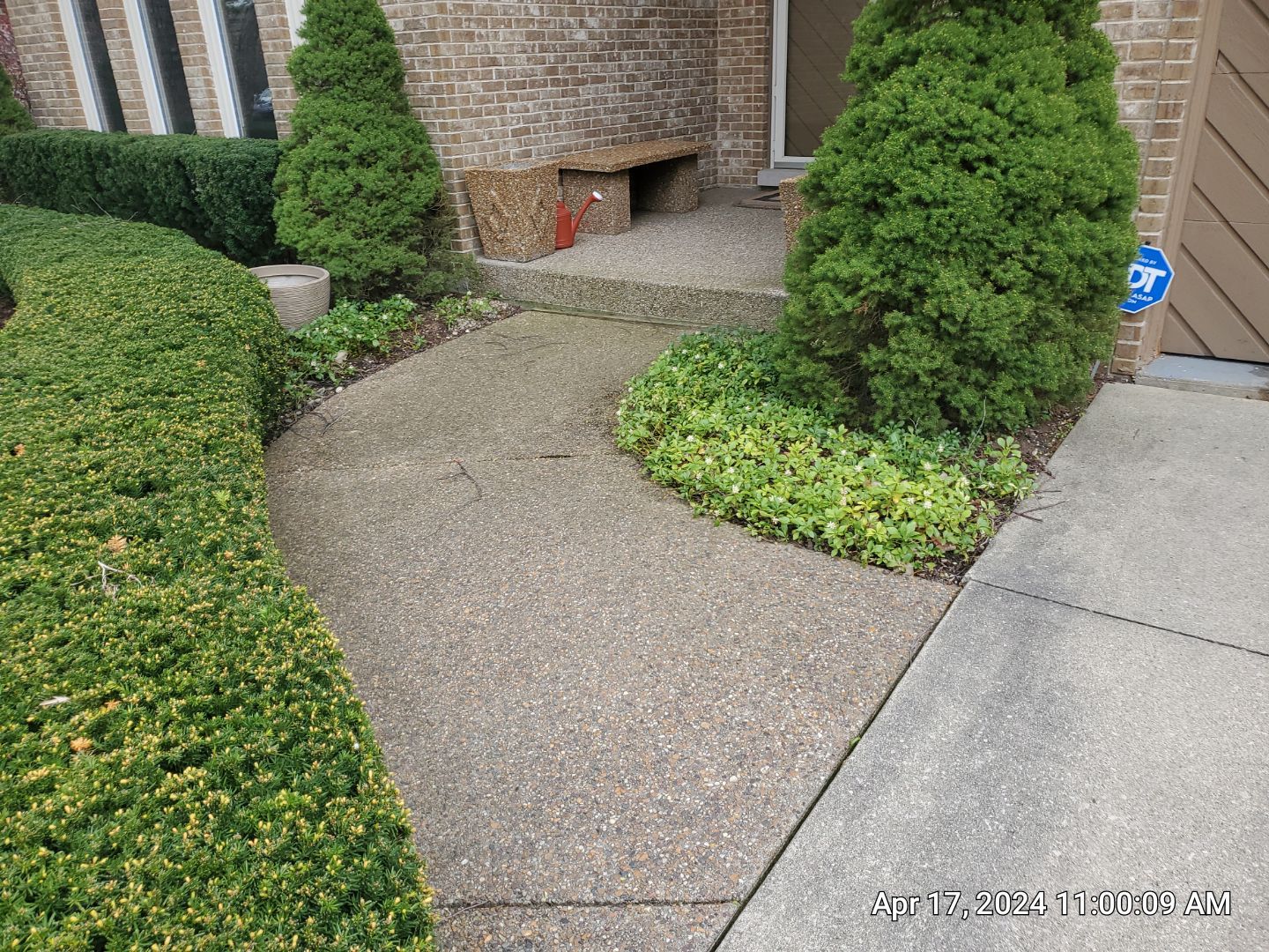 concrete patio and driveway cleaning by Northern Power Washing LLC.