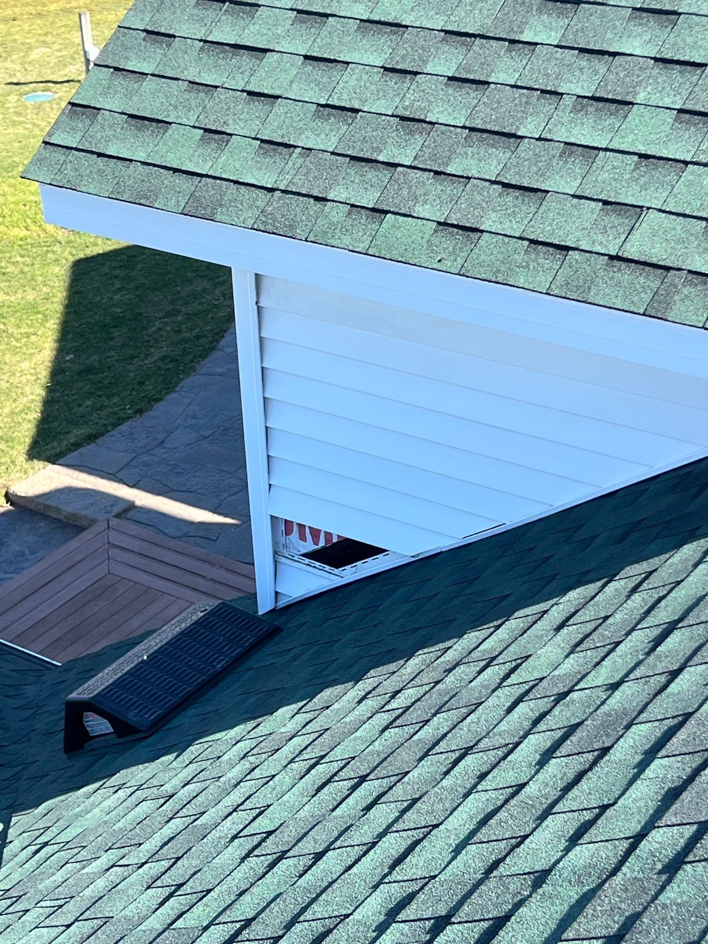 Residential Roofing Replacement with Multiple Skylights in Mason, Michigan by Acme Exteriors