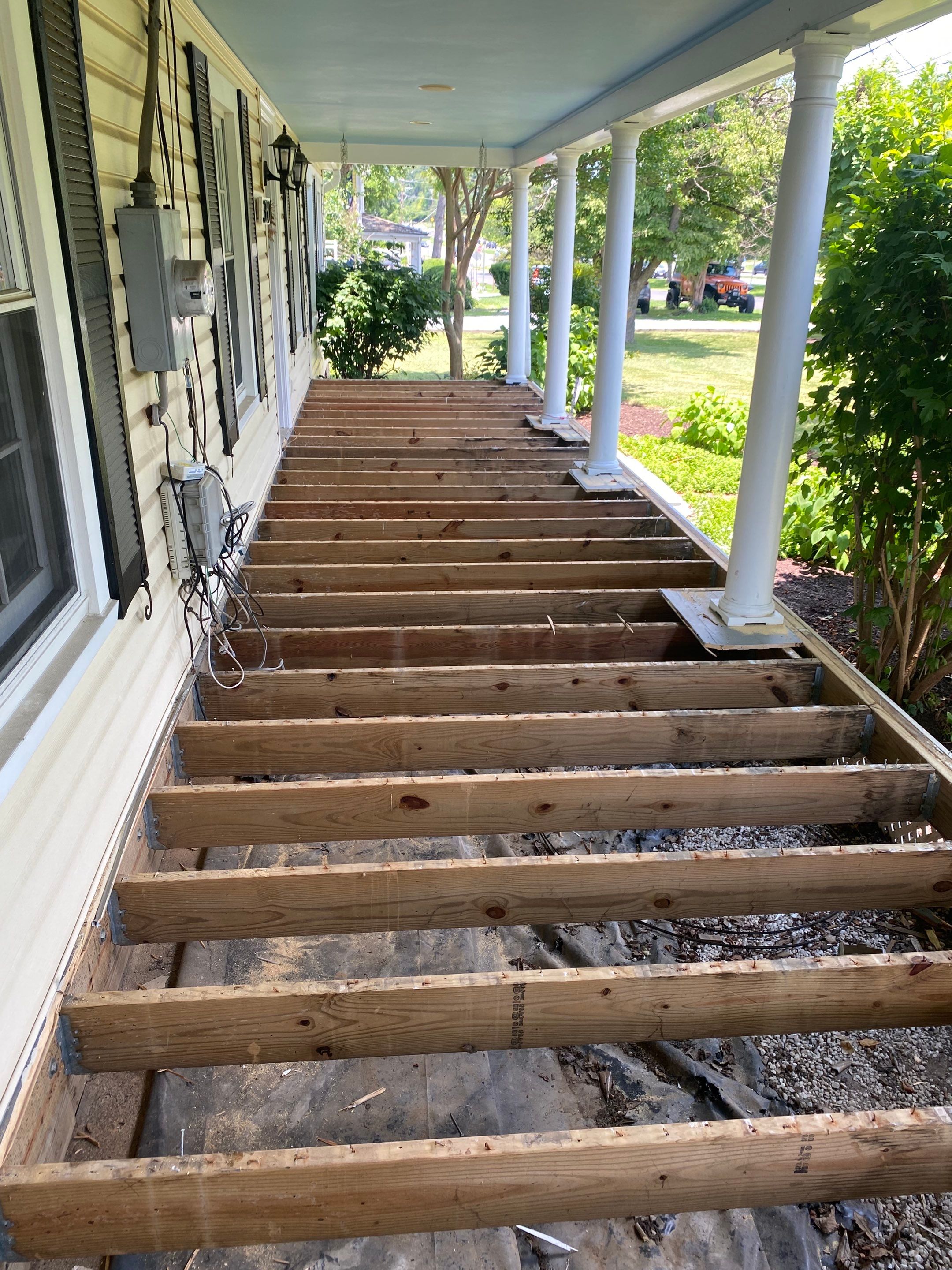 Front Porch Transformation using Timbertech Decking by The Smet Companies, LLC