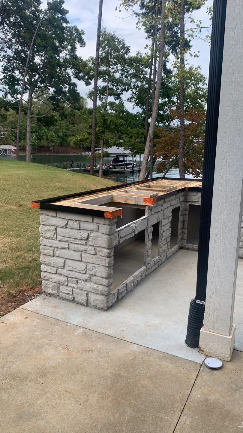 Outdoor Kitchen on Lake Keowee by Xtreme Concrete Services