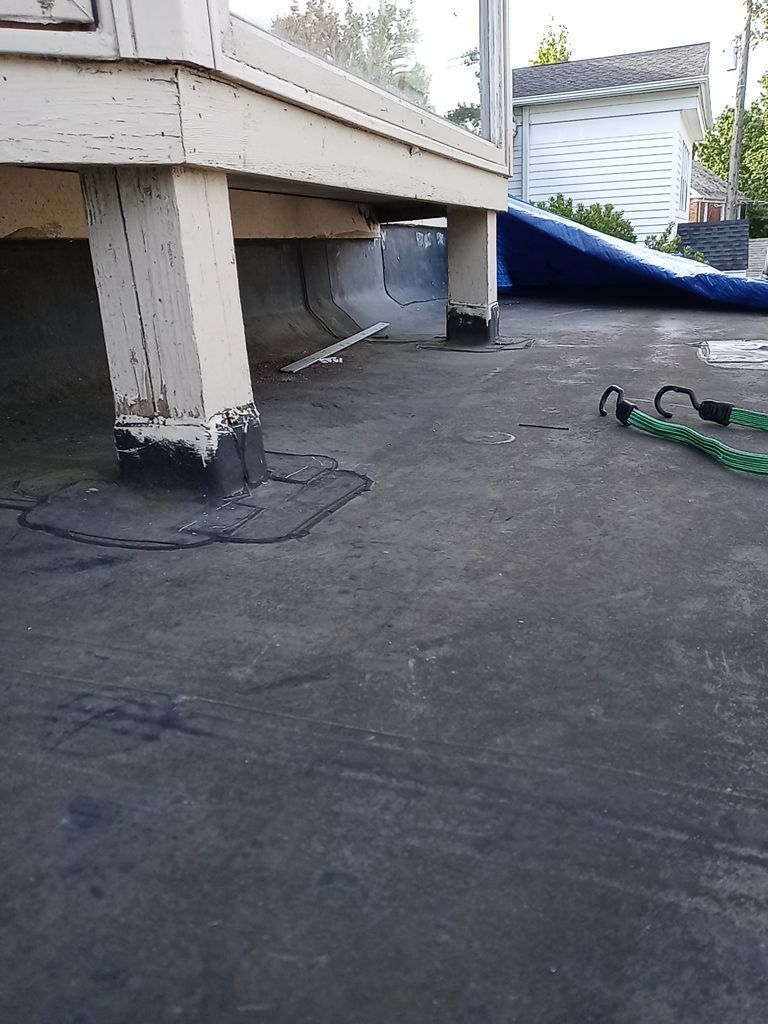 Residential Roofing Installation, Dec-tek walk-out porch roof, siding on garage by Absolute Roofing and Construction