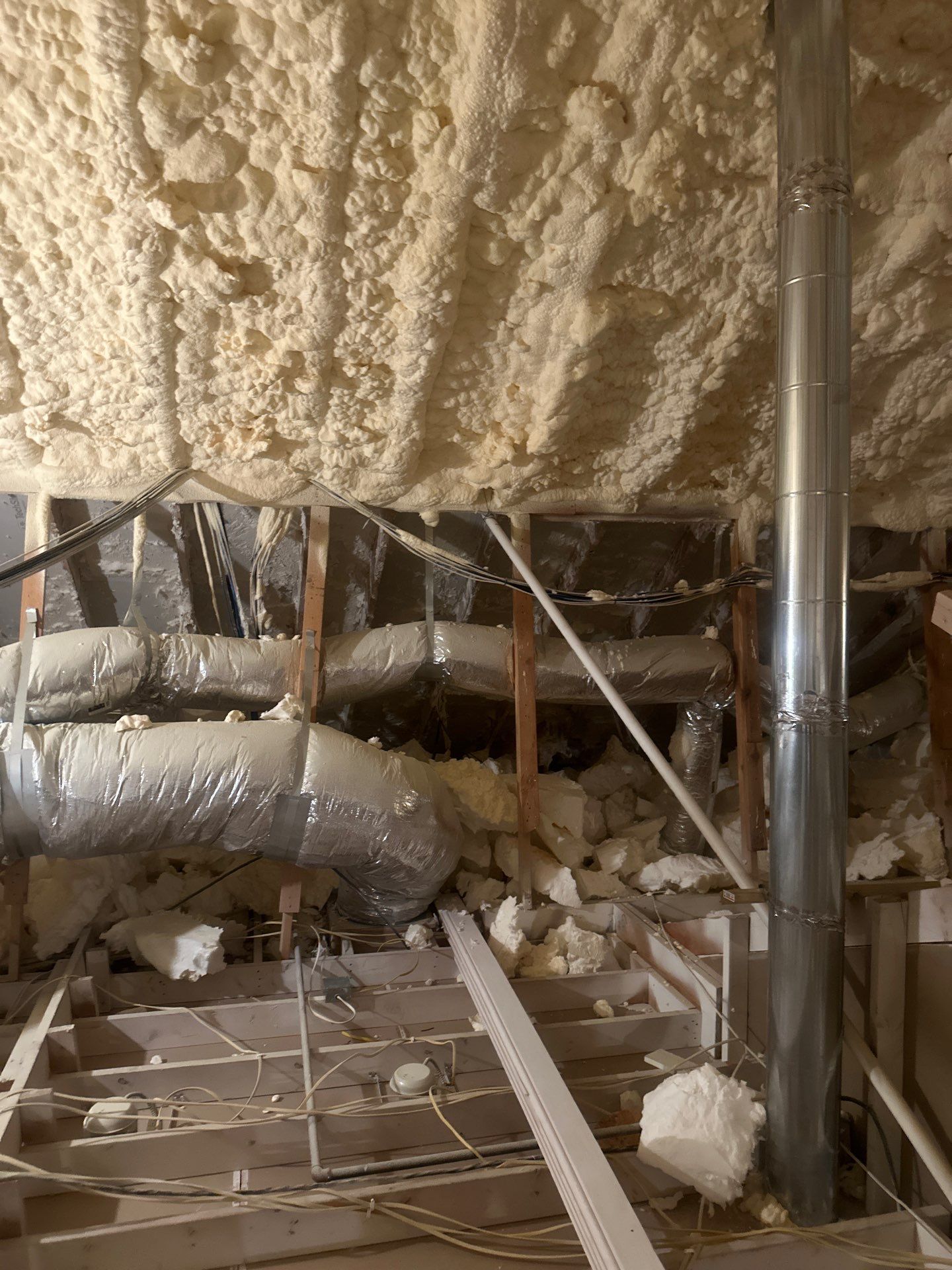 Spray foam insulation removal & re spray by Apex Insulation Solutions