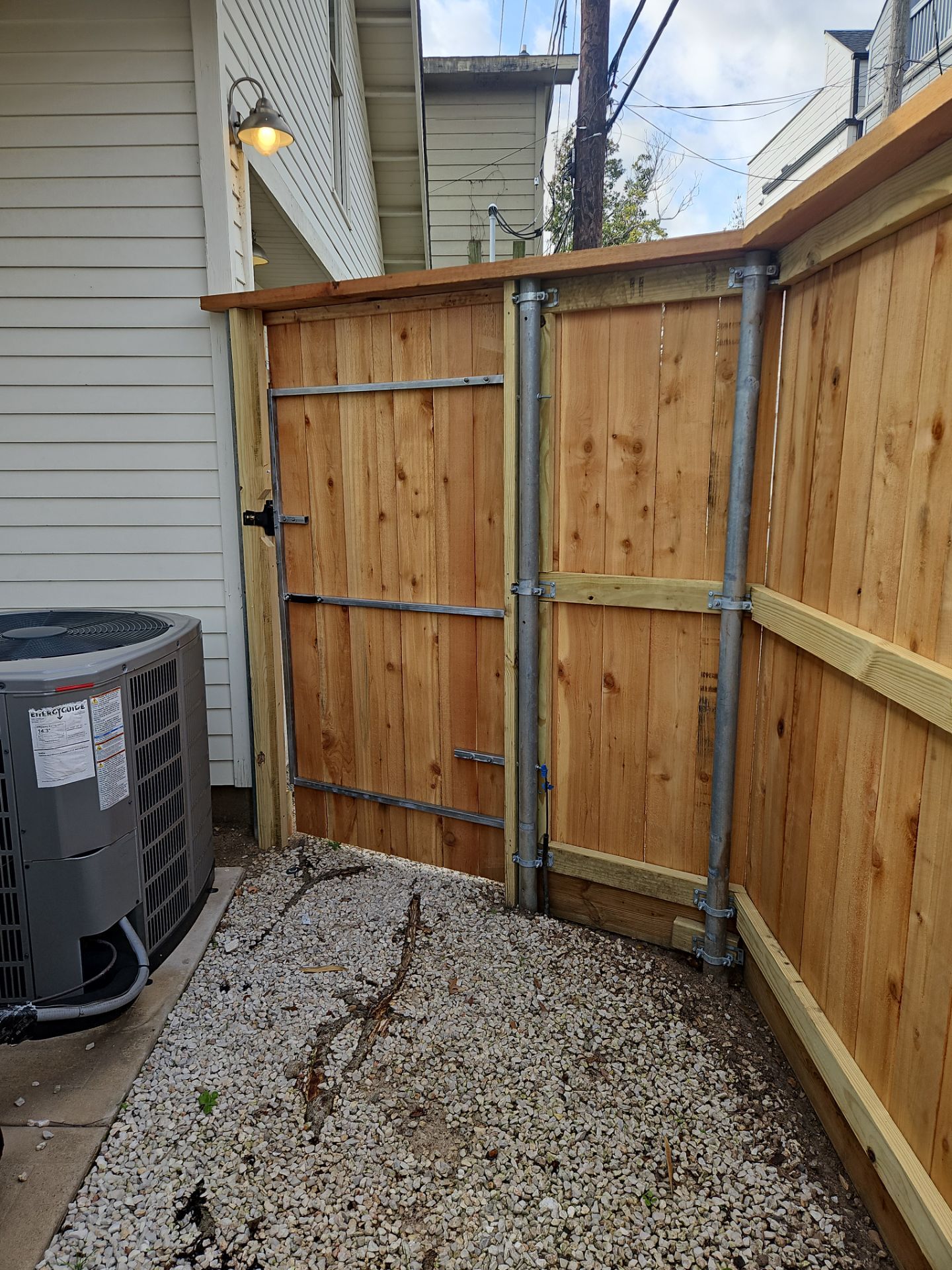 Durable Fence & Gate Installation with Premium Stain by Tim's Fences