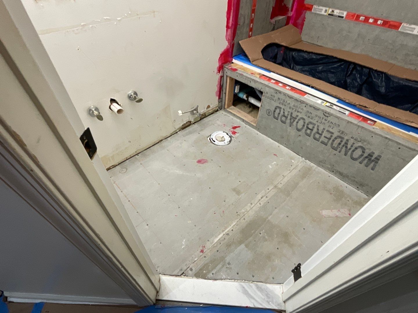 Bathroom Remodel using Two new bathroom design and new floors by Alpha Design Services