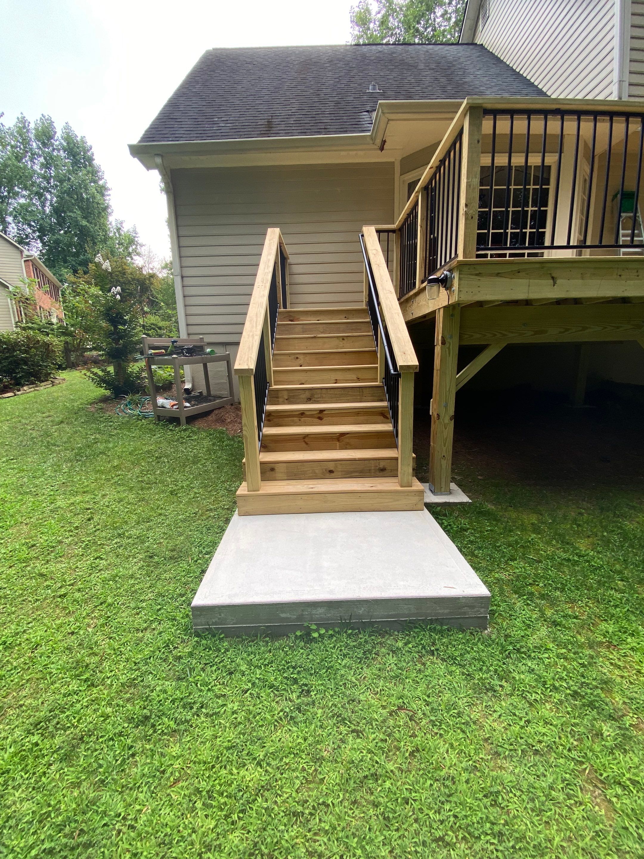 Custom Elevated Wood Deck and Screened Porch in Marietta by Swift Home Renovations