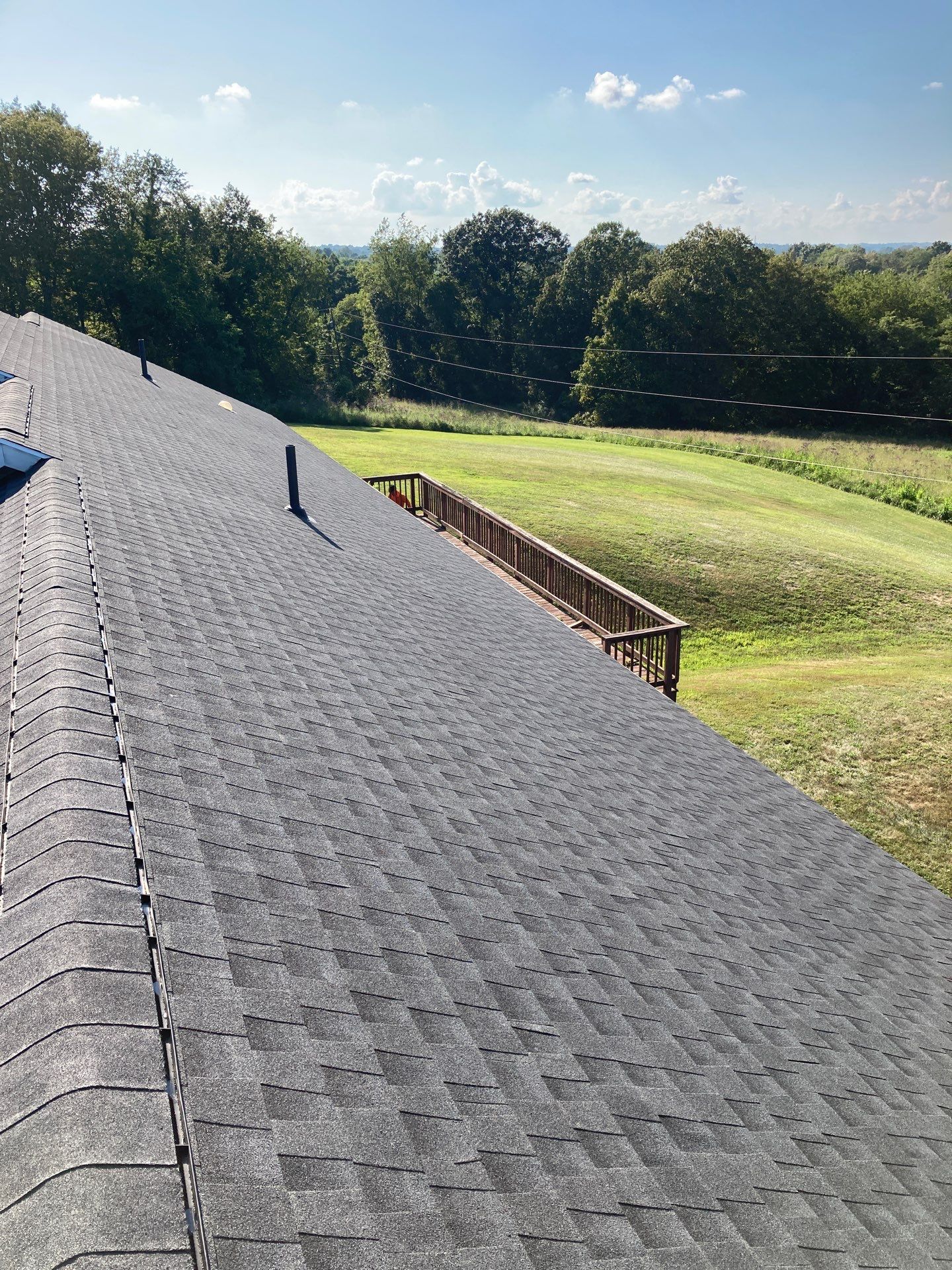 Residential Roofing Installation using GAF Timberline HDZ Charcoal by Rainstoppers Roofing